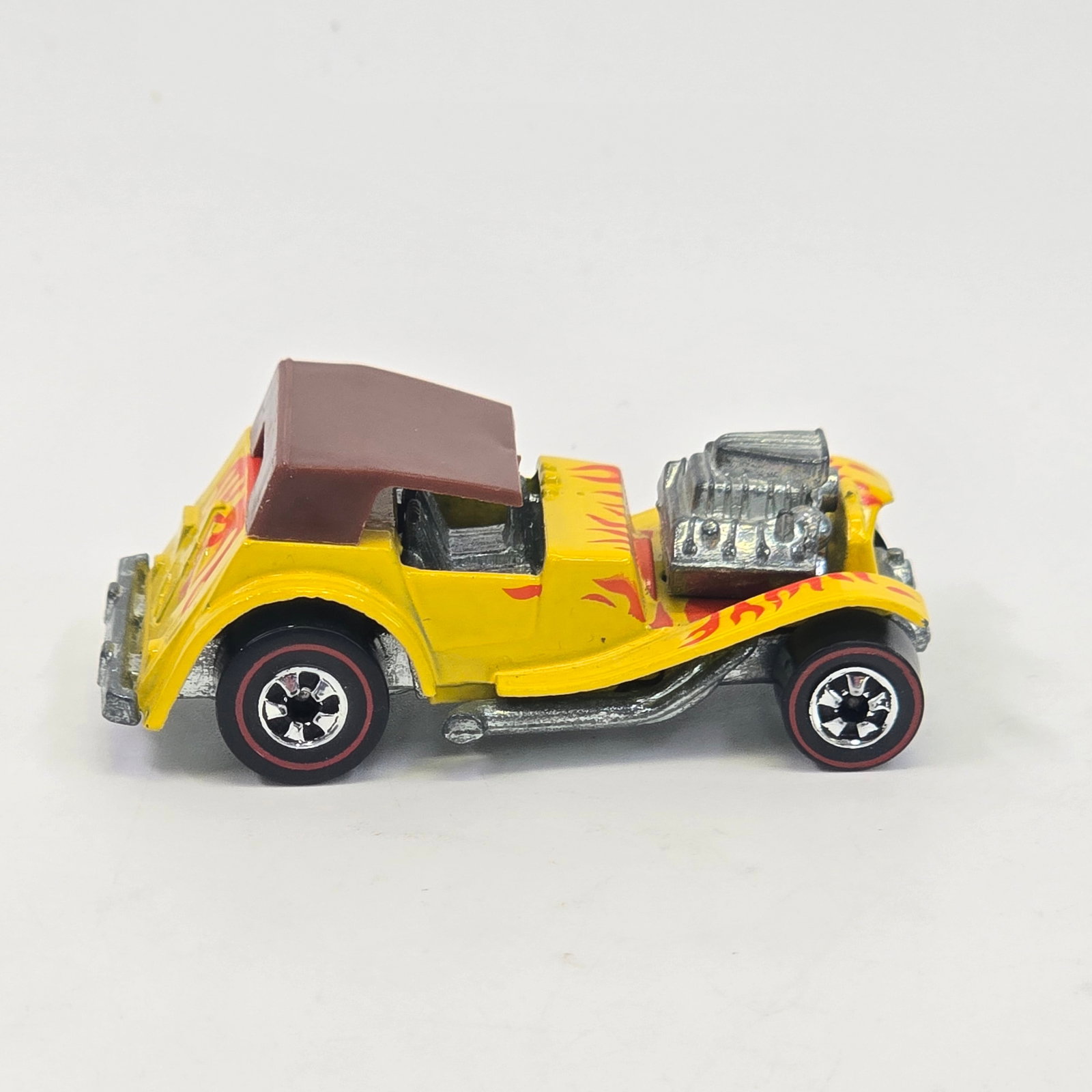 Hot Wheels Redline Sir Rodney Roadster: Hot Wheels Redline Sir Rodney Roadster Paint: Excellent with a few scattered micros Tampos: Excellent Wheel Chrome: Excellent Glass: NA, excellent original cap Base: Excellent <