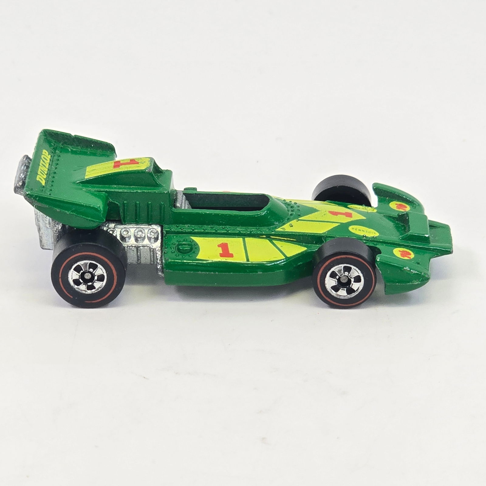 Hot Wheels Redline El Ray: Hot Wheels Redline Green Enamel El Ray Special Paint: Very good with just a bit of hard edge wear at front and corners Tampos: Excellent Wheel Excellent Glass: NA Base: Excellent <