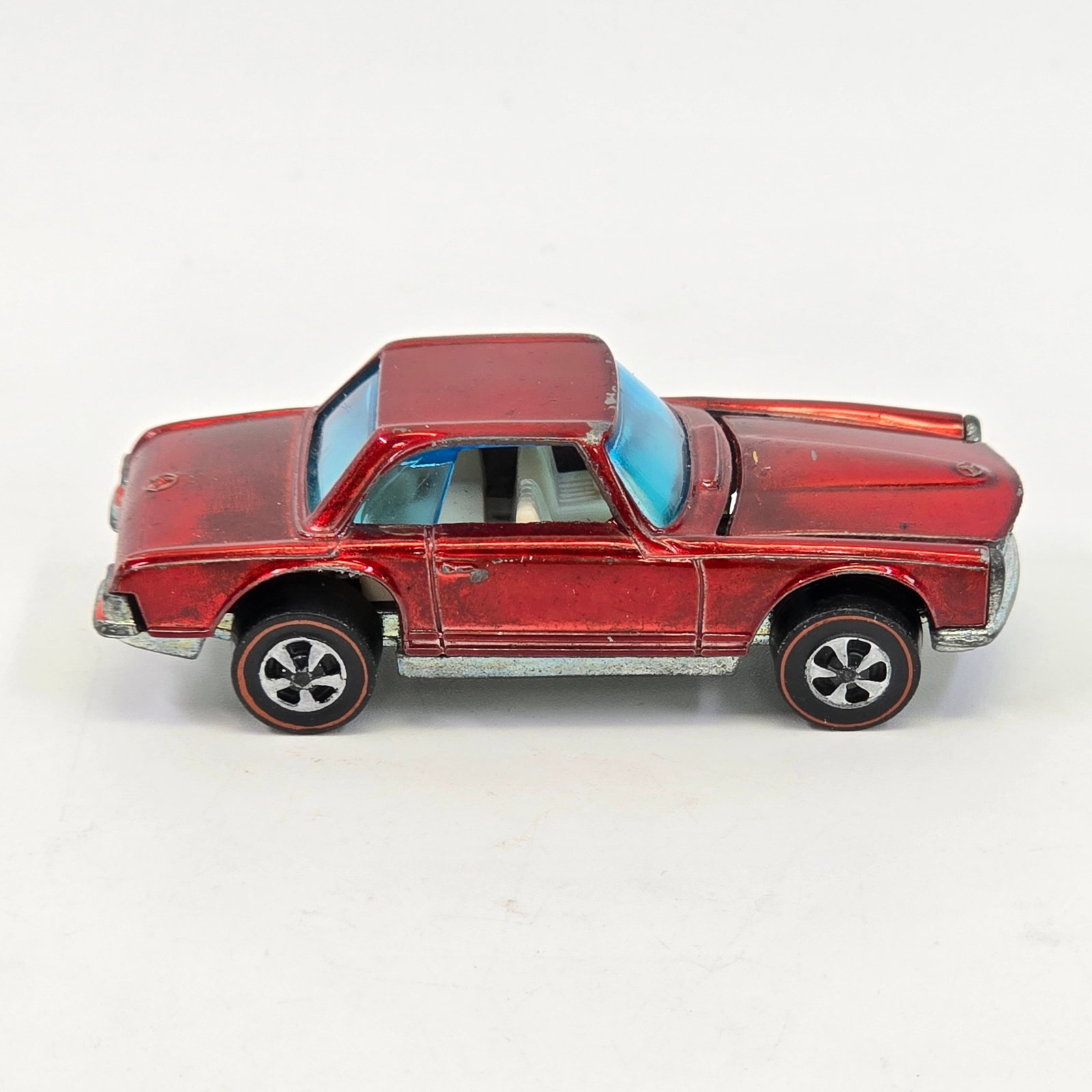 Hot Wheels Redline Mercedes 280sl: Mercedes 280sl - Red/HK/White int. Glass- looks to be in good shape, no major damage Wheels - excellent with very light wear at centers Base & engine- both are clean Paint- Paint has sharp edge we