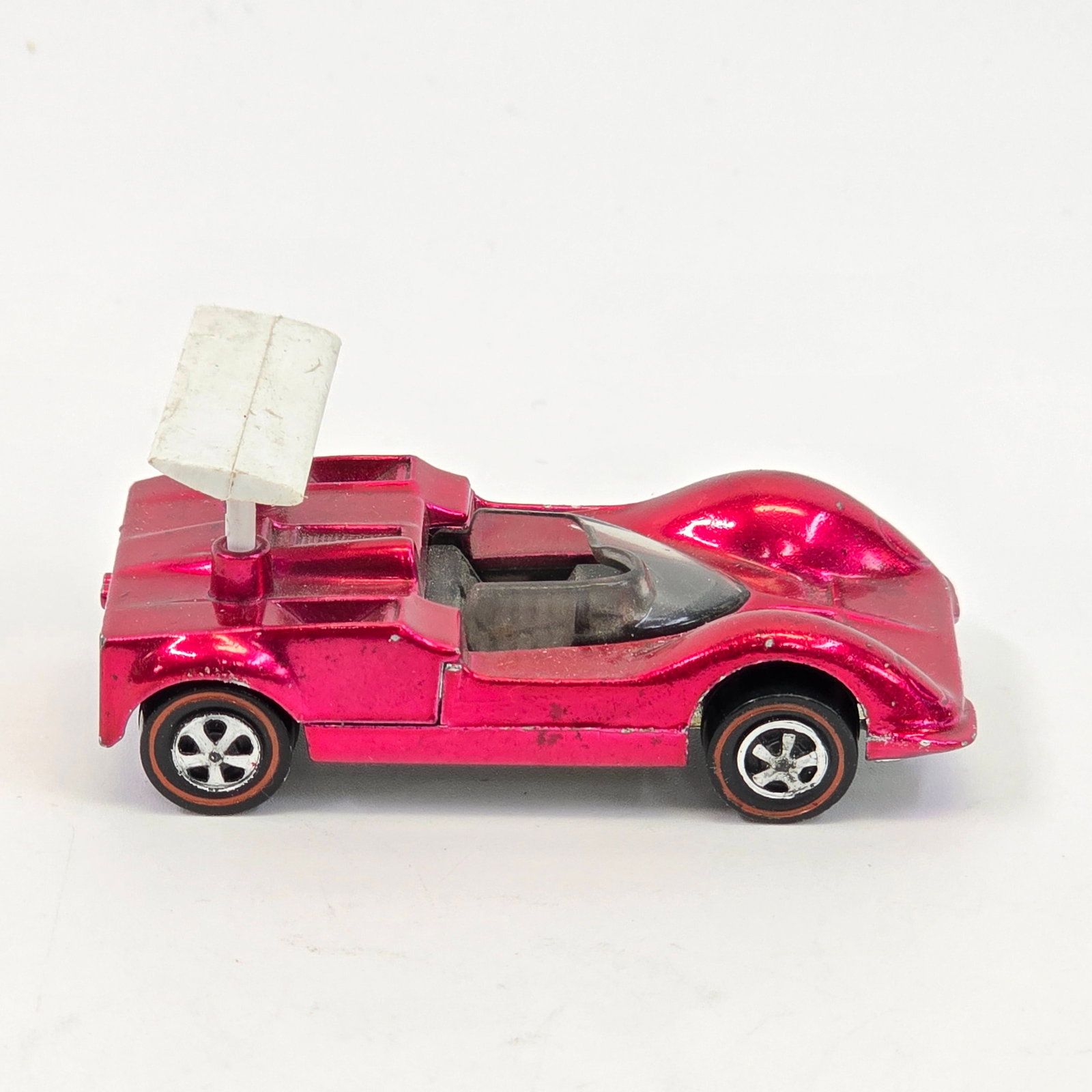 Hot Wheels Redline Chaparell: Chaparell - Rose/US/Black int. Glass- looks to be in good shape, no major damage Wheels/ Wing - excellent , clean original wing Base & engine- base is clean with kid marker as seen, engine chrome 