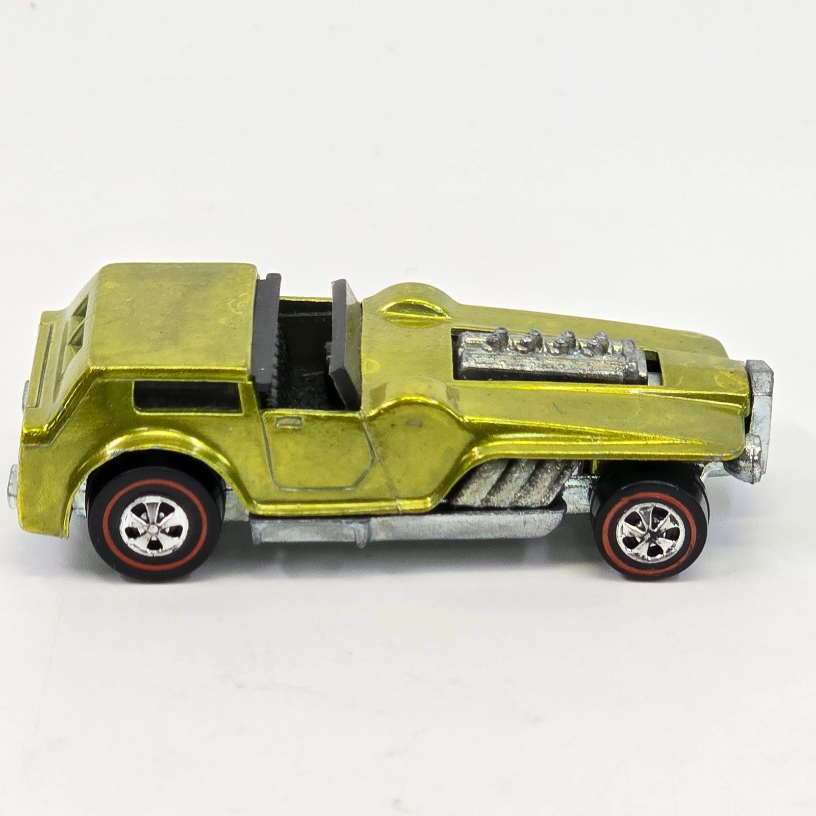 Hot Wheels Redline The Hood: The Hood - Yellow/US/dark int Paint- excellent with no wear of note, it has toned consistently darker, tail paint is 75% Engine/ Base- excellent, clean base and motor Glass/ Wheels- wheels are excelle