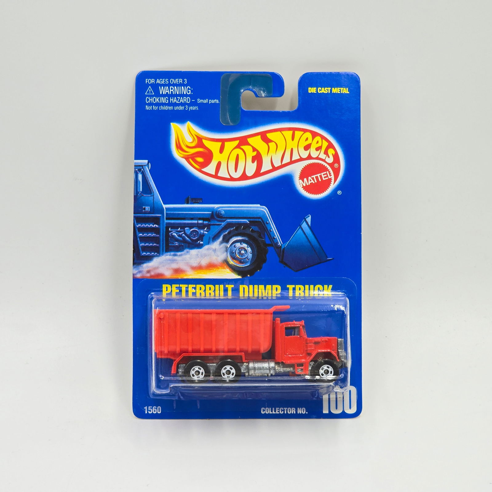 Hot Wheels Blue Card Dump Truck: Hot Wheels Blue Card #100 Peterbilt Dump Truck Car: Excellent with no issues of note Card: Excellent, it may have mild lower edge and corner wear Blister: Clear, crack free and firmly attached to