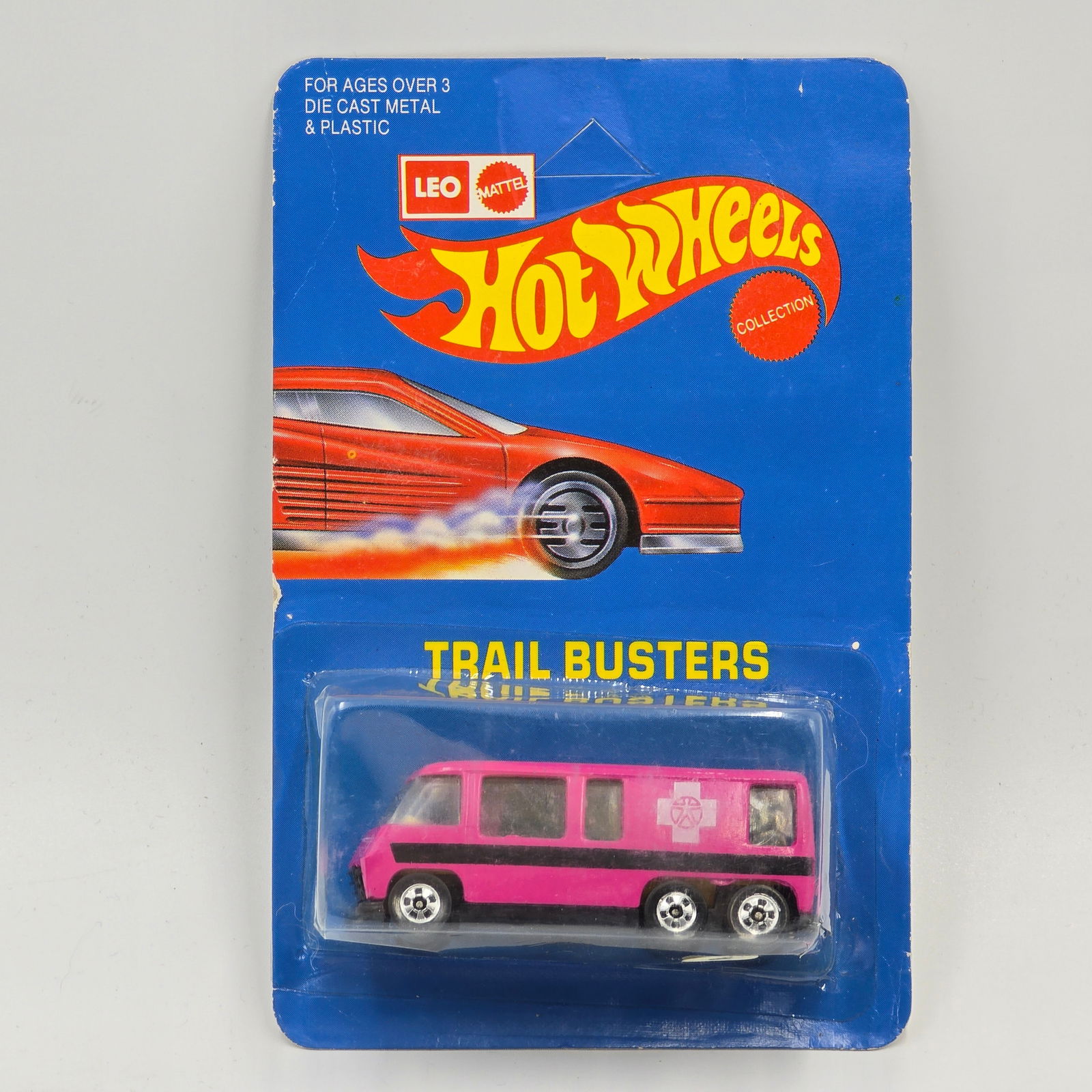 Hot Wheels Leo Trail Busters GMC: Hot Wheels Leo India Trail Busters GMC Motorhome - this is pink/lavendar Car: Excellent with no issues of note Card: Very good, unpunched with some edge dings and lower edge and corner curl Blister: C