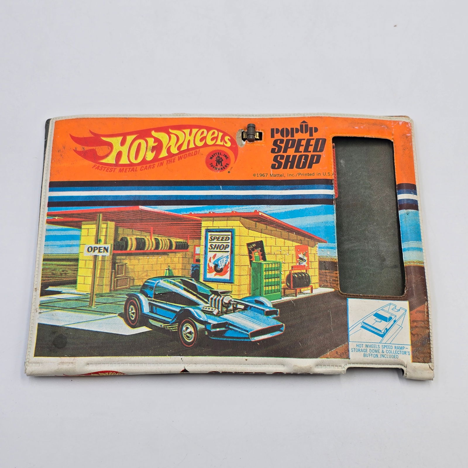 Hot Wheels Pop Up Speed Shop: Hot Wheels PopUp Speed Shop Collector Case Case is near complete, missing the Car keeper and car of course. This case is pretty clean, I dont see any splits in the vinyl though it may have small ones