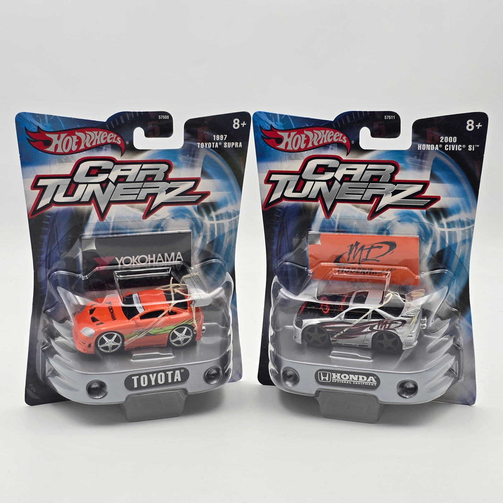 Hot Wheels Car Tunerz Pair: Hot Wheels Car Tunerz Pair, includes a 2000 Honda Civic Si and a 1997 Toyota Supra Cars look to be in good condition but do have the typical rubber band issues associated with these, so may have damag