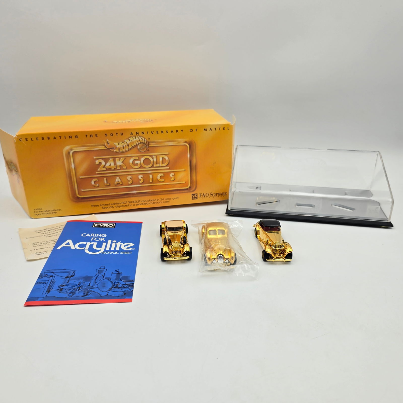 Hot Wheels FAO Schwarz 24k Gold Set: Hot Wheels FAo Schwarz 24K Gold Classics 3 car set All cars appear excellent Box is open but appears to have all contents including papers, all contents appear to be in excellent condition, oute