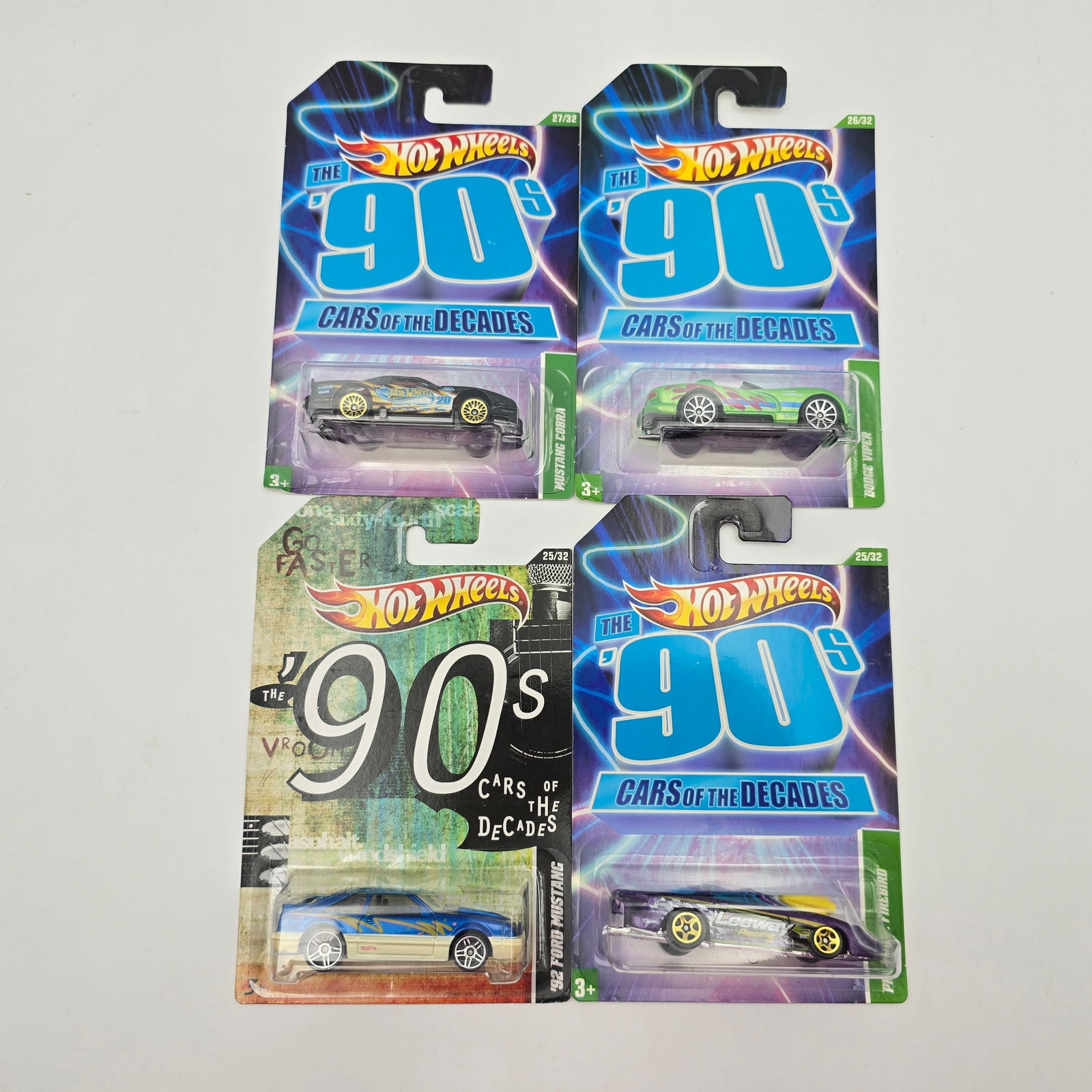 Hot Wheels Cars of the Decades lot of 4: Hot Wheels 90's Cars of the Decades lot of 4, including - Dodge Viper, Mustang Cobra, 92 Mustang and Pro Stock Firebird All cars appear excellent with no issues of note Cards are good but may have sca