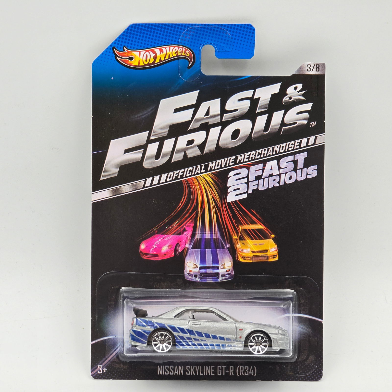 Hot Wheels Nissan Skyline GT-R: Hot Wheels 2 Fast 2 Furious Nissan Skyline GT-R (R34) - This is the tougher black spoiler variation Car appears excellent with no issues of note Card is excellent but may have scattered spots of corne