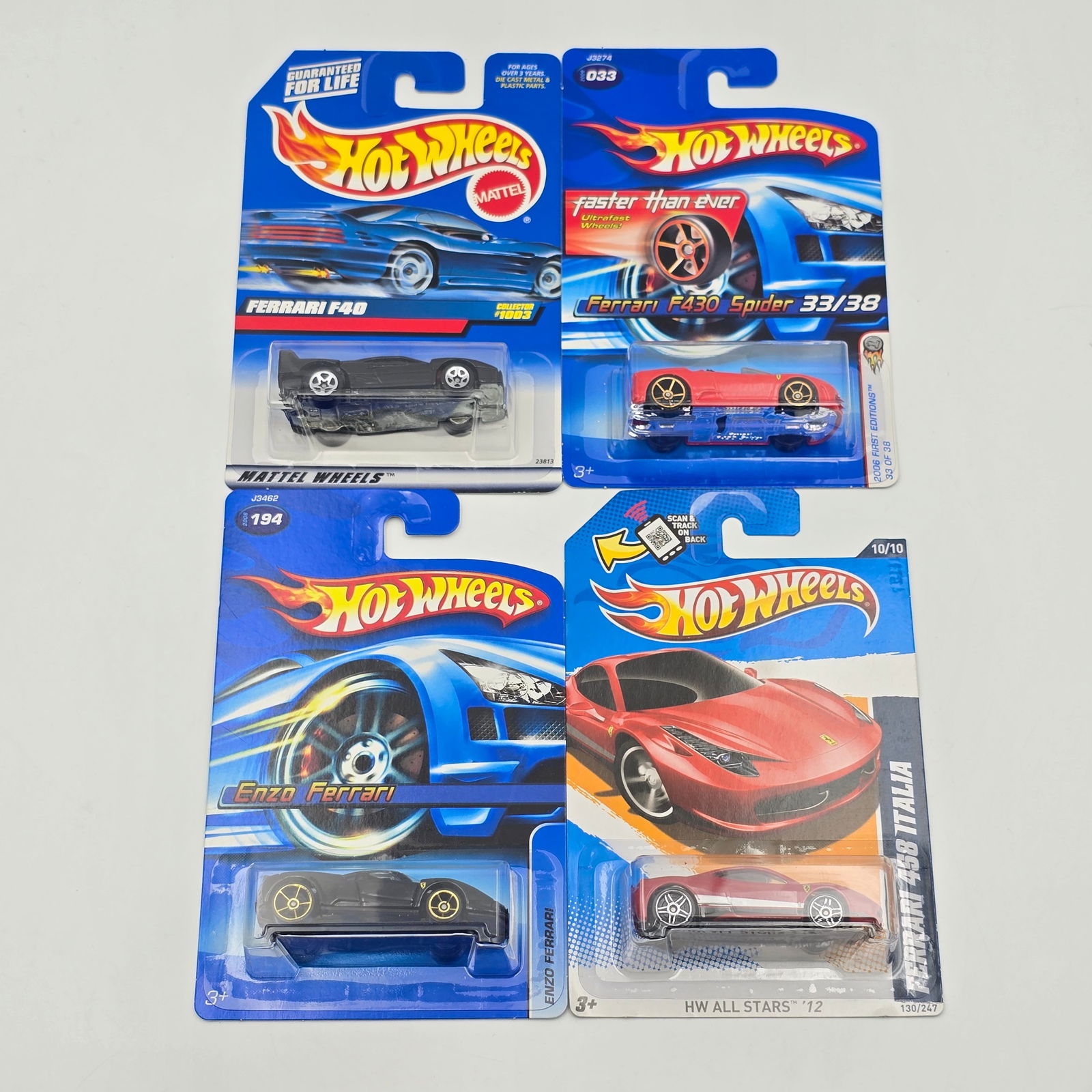 Hot Wheels Ferrari lot of 4: Hot Wheels Ferrari lot of 4, includes - black Ferrari F40, Ferrari F430 Spider, Enzo Ferrari and Ferrari 458 Italia All cars appear excellent with no issues of note Cards are good but may have scatter
