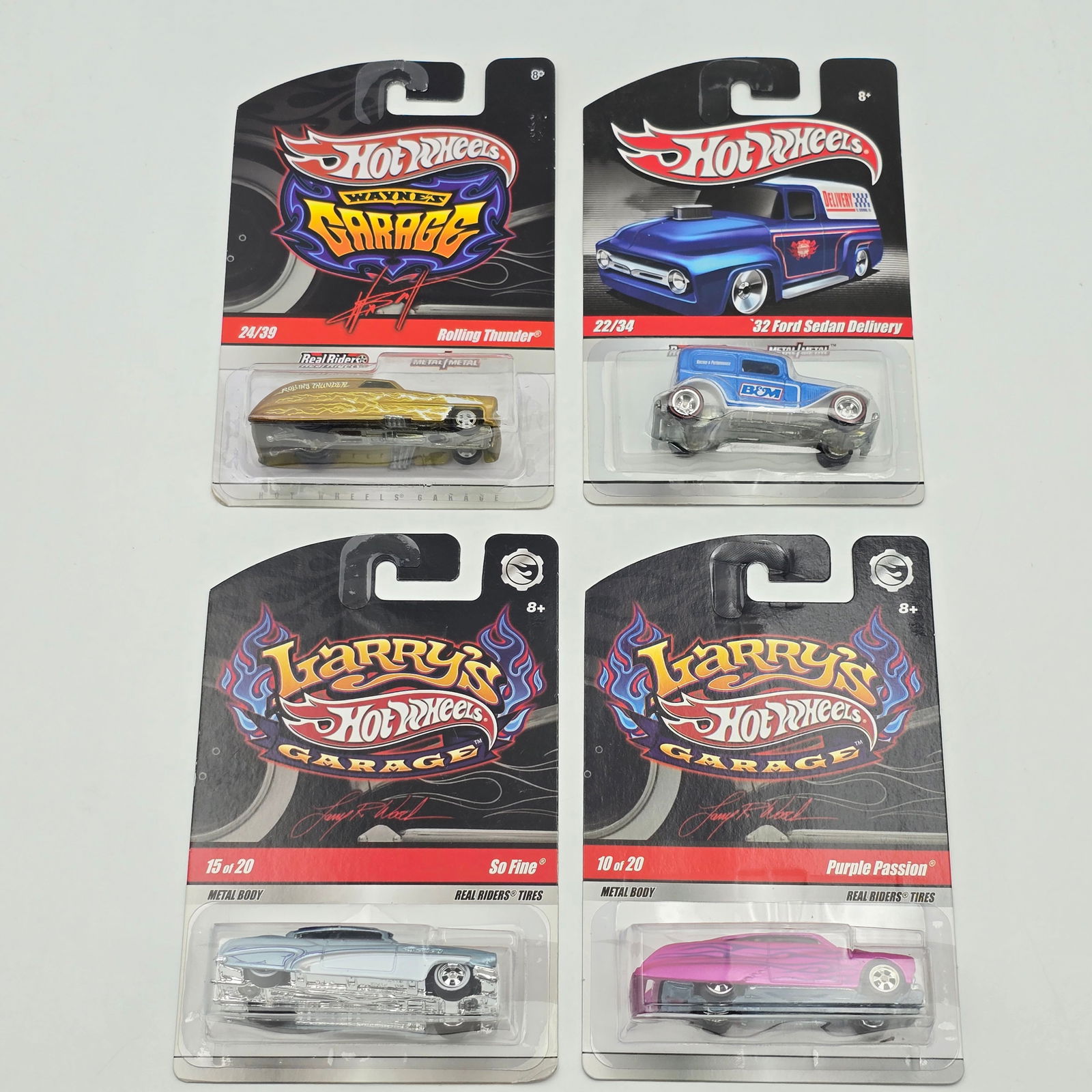 Hot Wheels LW Garage lot of 4: Hot Wheels Larry Woods Garage lot of 4, includes - Larry Woods So Fine, Wayne's Rolling Thunder, Larry Woods Purple Passion and a 32 Ford Sedan All cars appear excellent with no issues of note Card