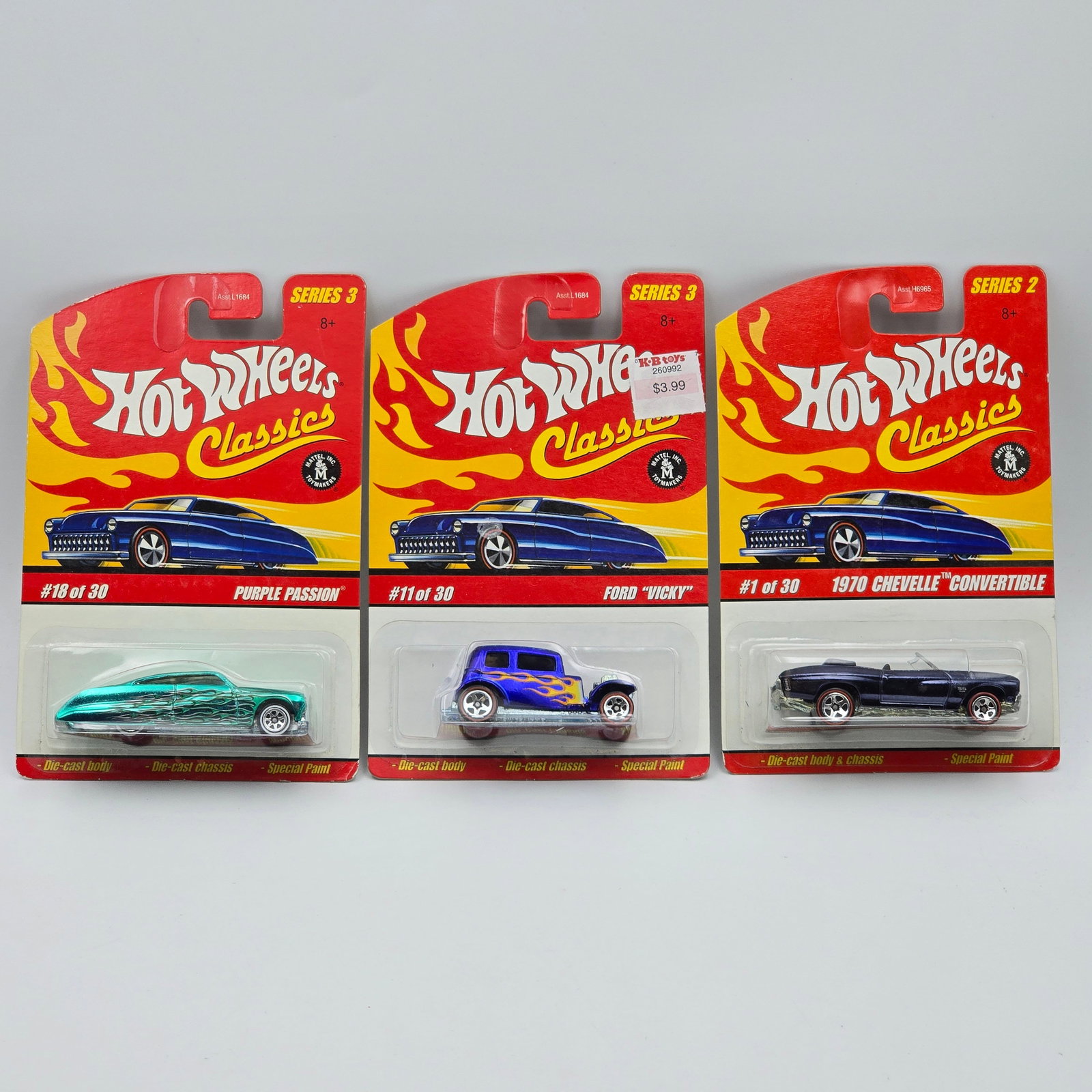 Hot Wheels Premium 3 car lot: Hot Wheels Premium 3 car lot, includes Classics Series 2 blue 1970 Chevelle Convertible, Series 3 aqua Purple Passion, blue Ford Vicky All cars appear excellent with no issues of note Cards are goo