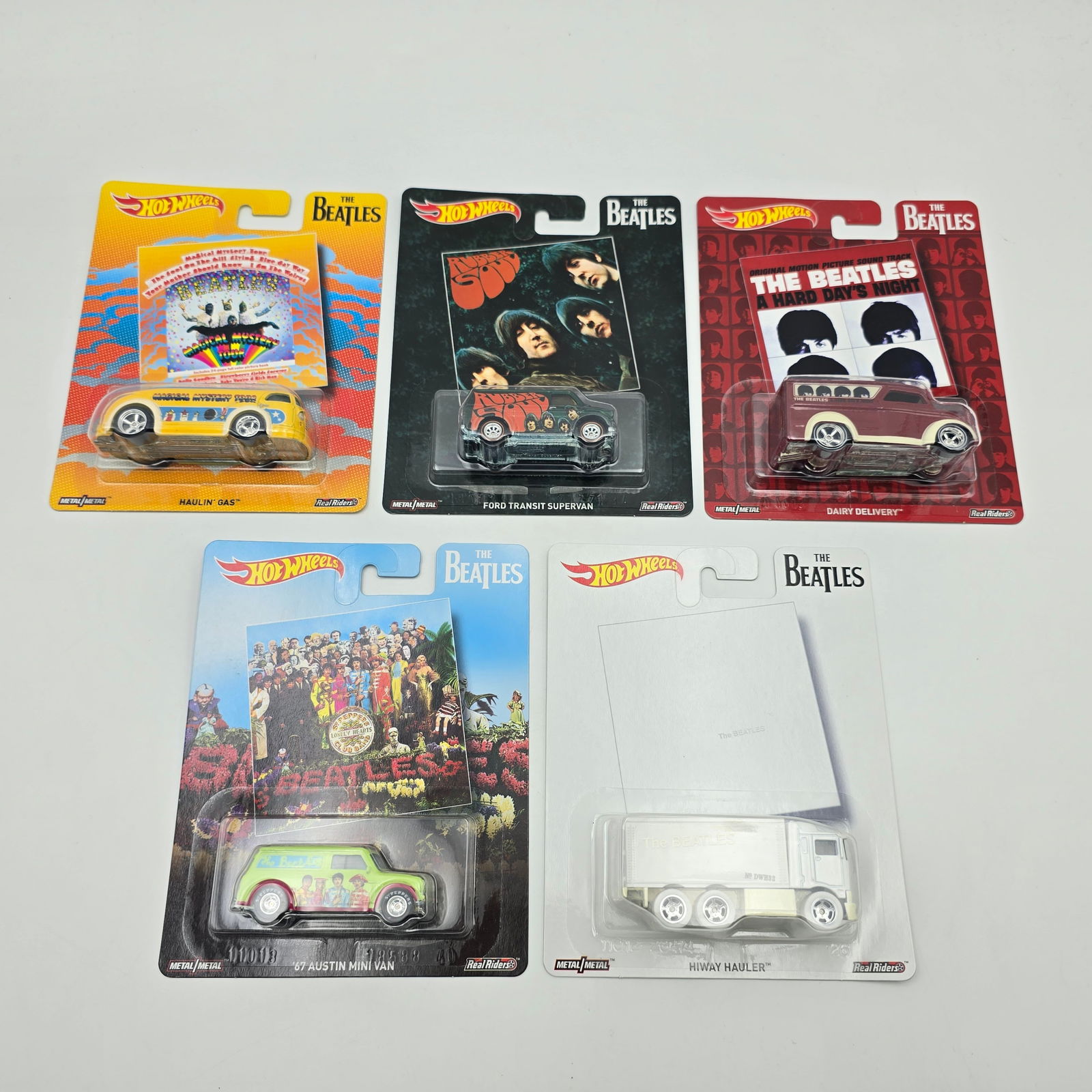 Hot Wheels Beetles 5 car set: Hot Wheels 2017 Beetles 5 car set includes - Ford Transit Supervan, Dairy Delivery, 67 Austin Mini Van, Haulin Gas and Hiway Hauler All cars appear excellent with no issues of note Cards are good b
