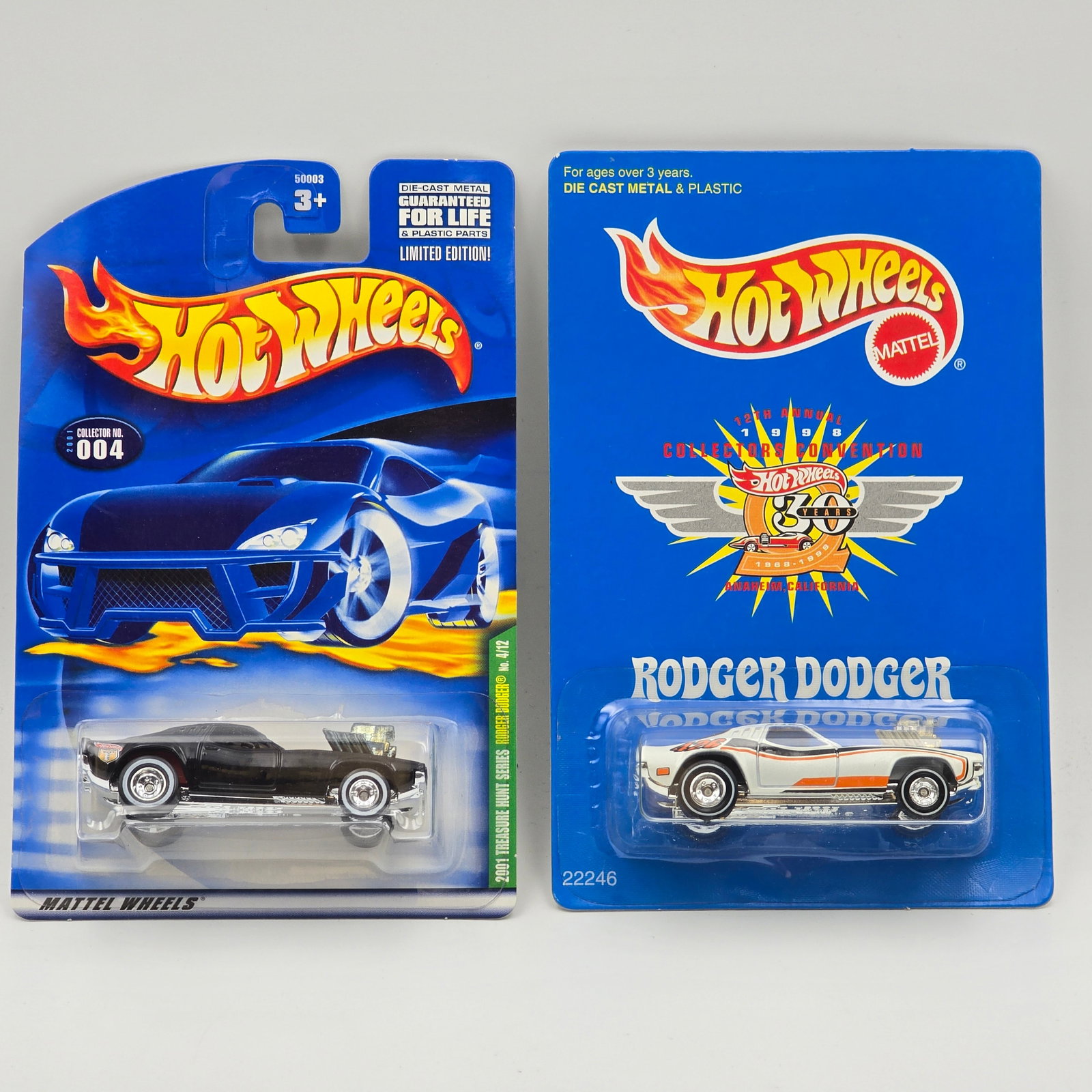 Hot Wheels Rodger Dodger Pair: Hot Wheels Rodger Dodger Pair, includes - 2001 Tresure Hunt and 1998 Collectors Convention Cars are excellent with no issues Cards are good but may have edge and/or corner wear in spots, please che