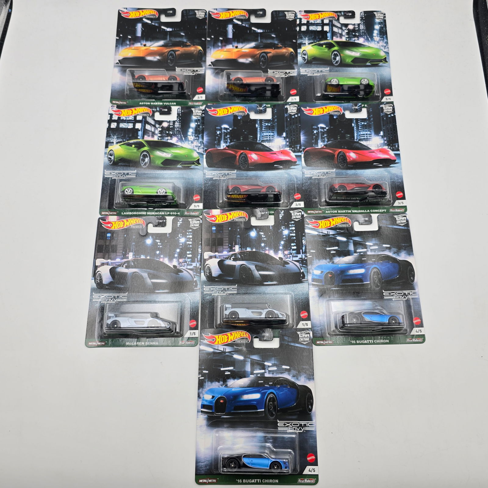 Hot Wheels 2 2021 Exotic Envy Sets: Hot Wheels (2) 2021 Exotic Envy sets, includes - (2) Aston Martin Vulcan, (2) Lamborghini Huracan LP 610-4, (2) Aston Martin Valhalla Concept, (2) McLaren Senna and (2) Bugatti Chiron Cars are excell