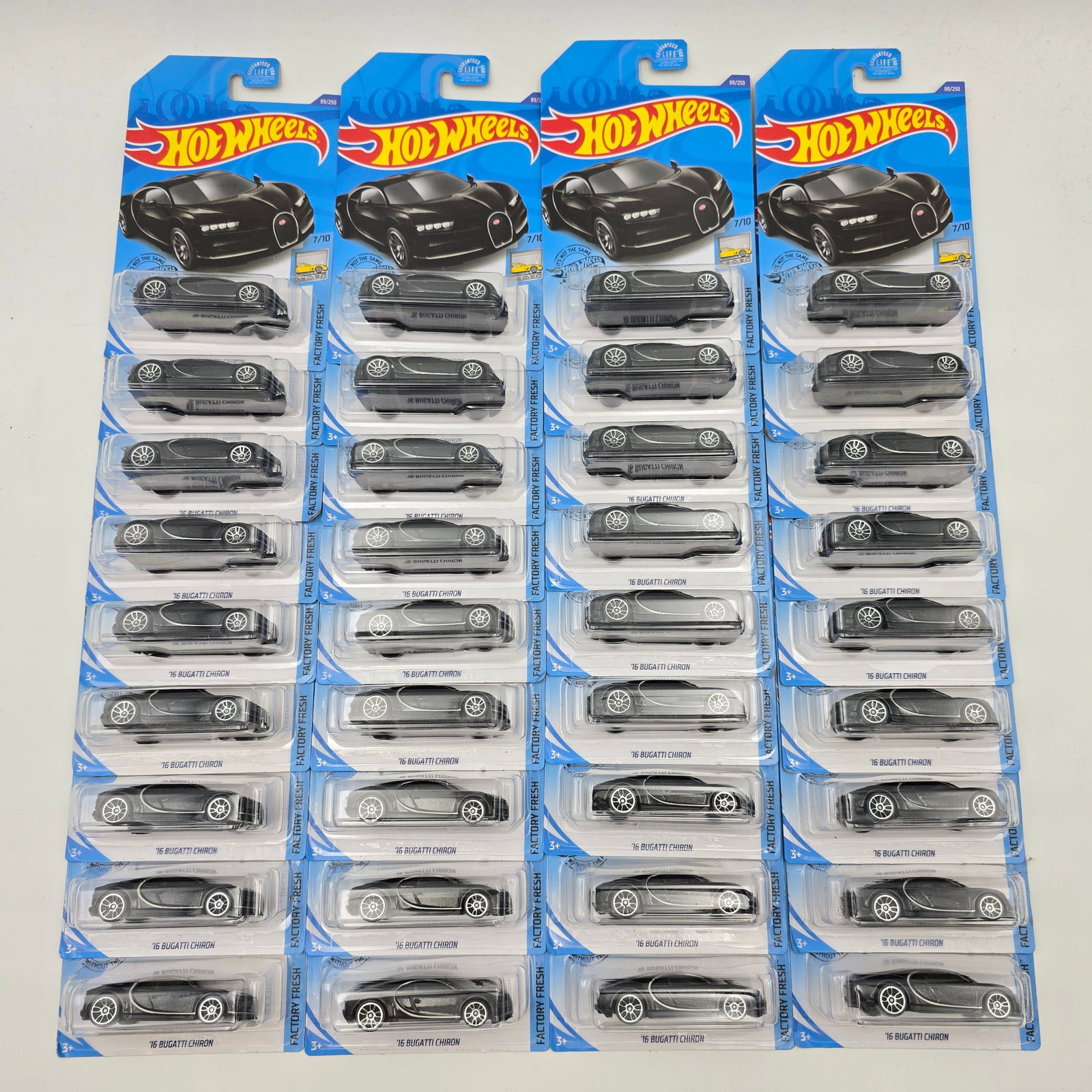 Hot Wheels '16 Bugatti Chiron lot of 36: Hot Wheels Factory Fresh black '16 Bugatti Chiron lot of 36 Cards appear excellent but may have edge and/or corner wear in spots, please check photos Blisters are clear and crack free