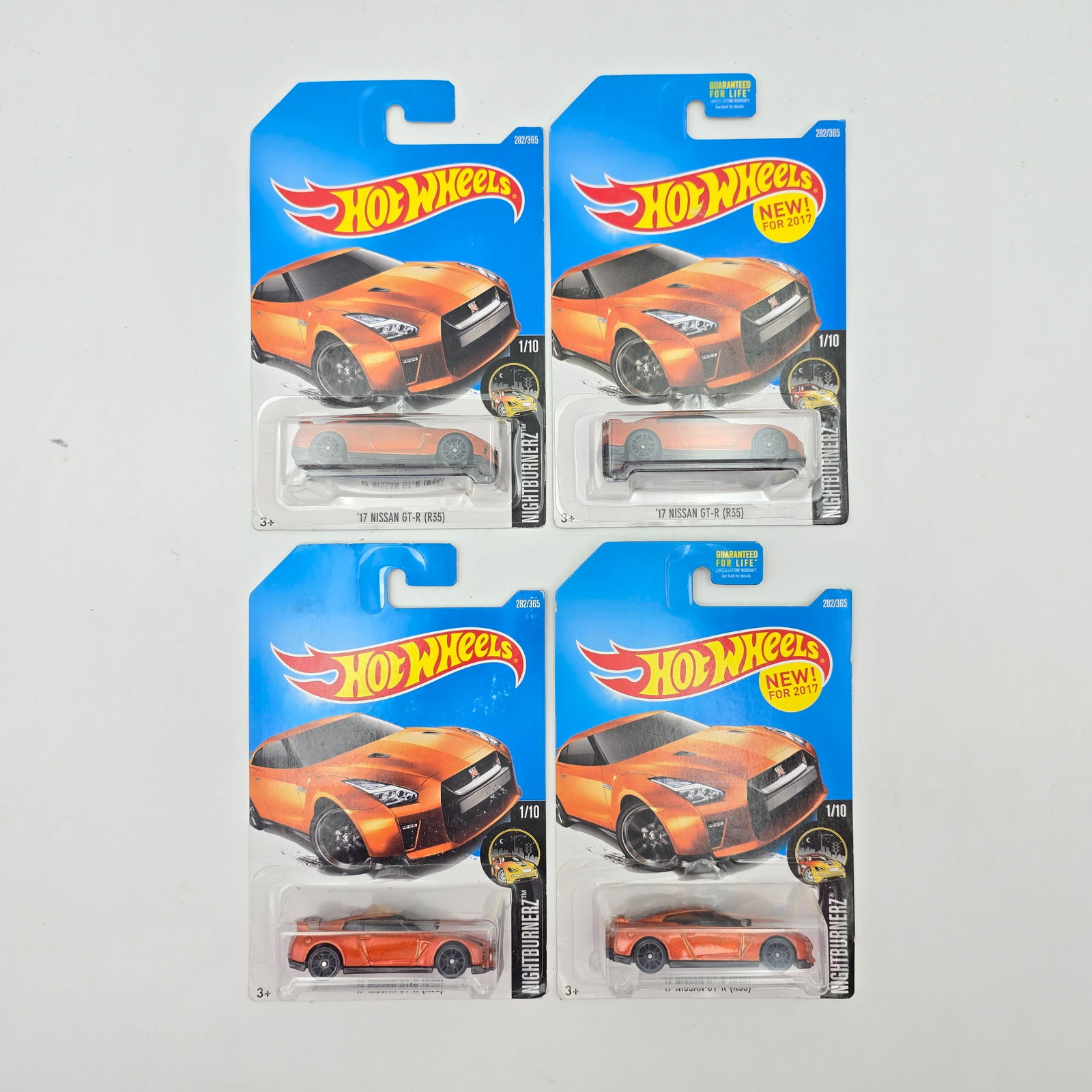 Hot Wheels Nissan GT-R lot of 4: Hot Wheels orange Nightburnerz 17 Nissan GT-R (R35) lot of 4 Cars are excellent Cards appear excellent but may have edge and/or corner wear in spots, please check photos 