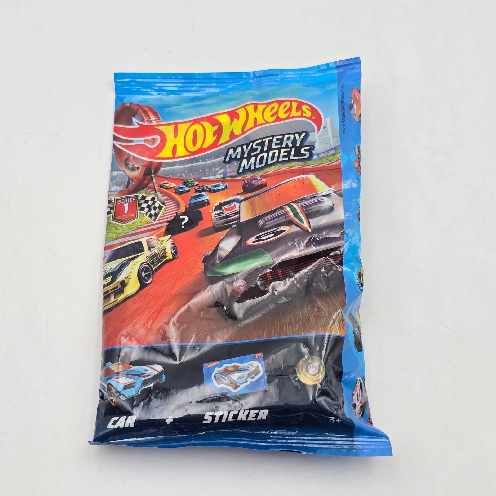 Hot Wheels Mystery Models Pack: Hot Wheels exclusive Mystery Models Blind Bag pack Pack is sealed, it does have creases and wrinkles as seen