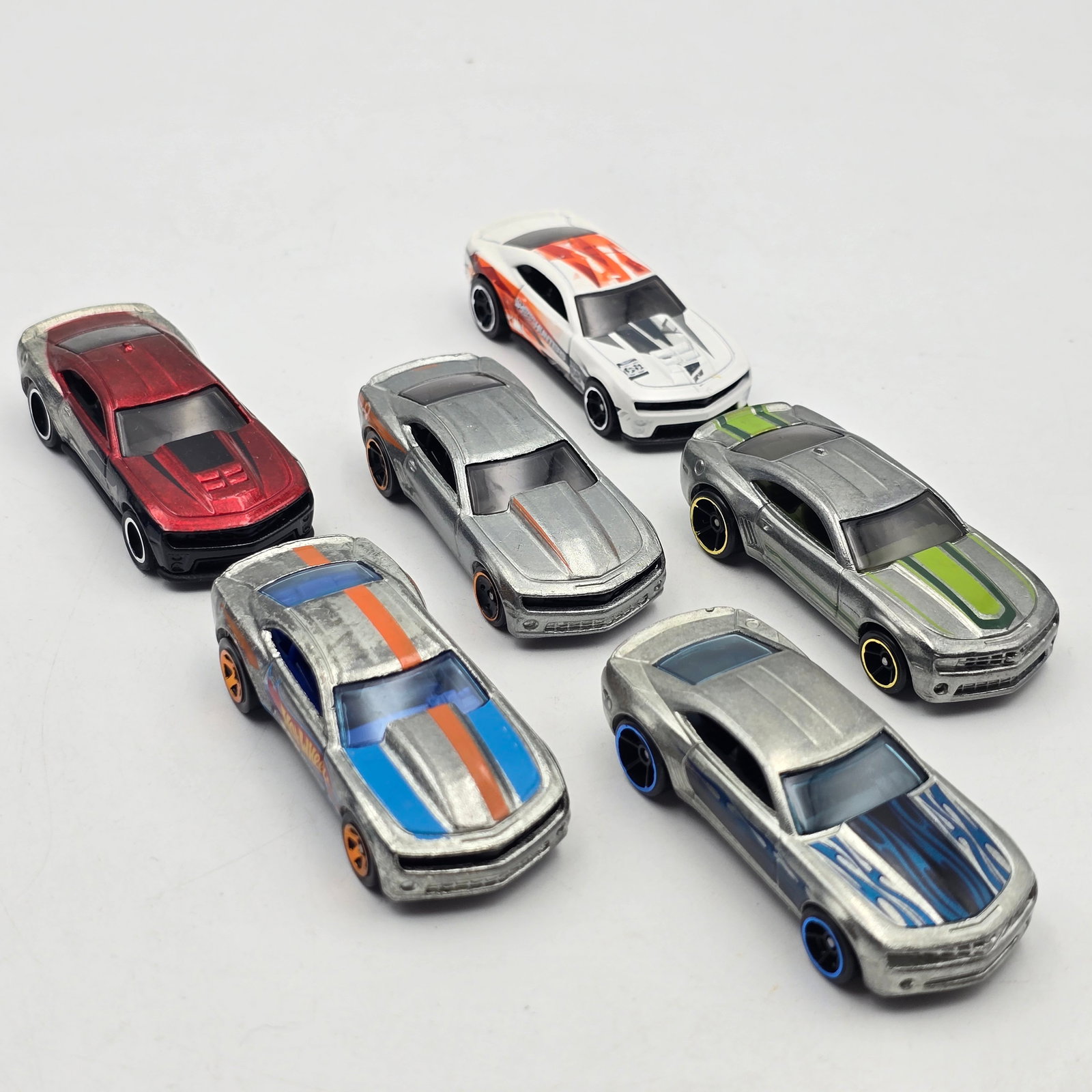Hot Wheels Zamac Camaro lot of 6: Hot Wheels Zamac Camaro lot of 6 Includes a mix Zamac Camaros as seen All appear to be good condition with no issues of note Please check photos for complete description