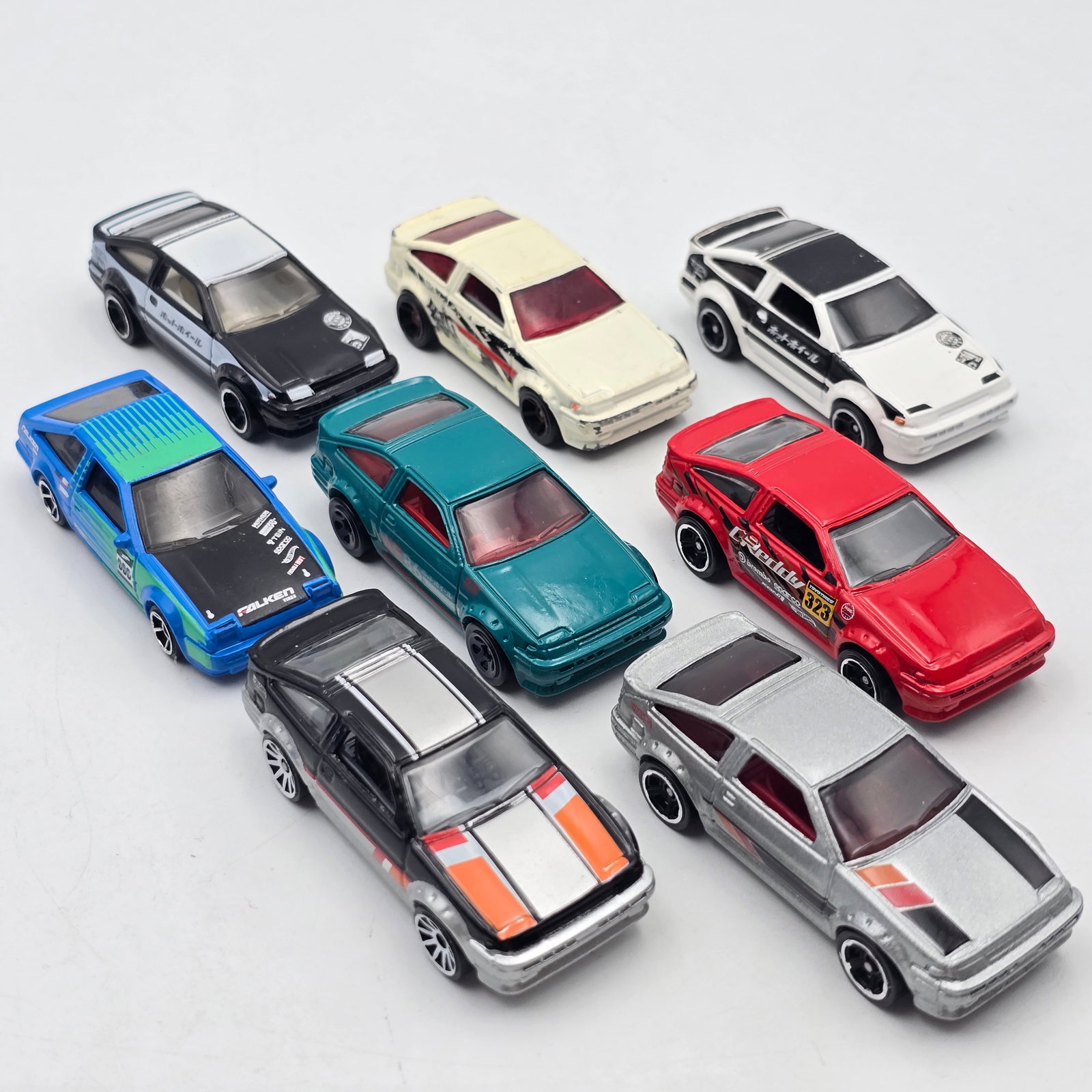 Hot Wheels Toyota Corolla lot of 8: Hot Wheels Toyota Corolla AE-86 lot of 8 All appear to be excellent to near mint with no issues of note except for the top White one has some play wear as seen Please check photos for complete descrip