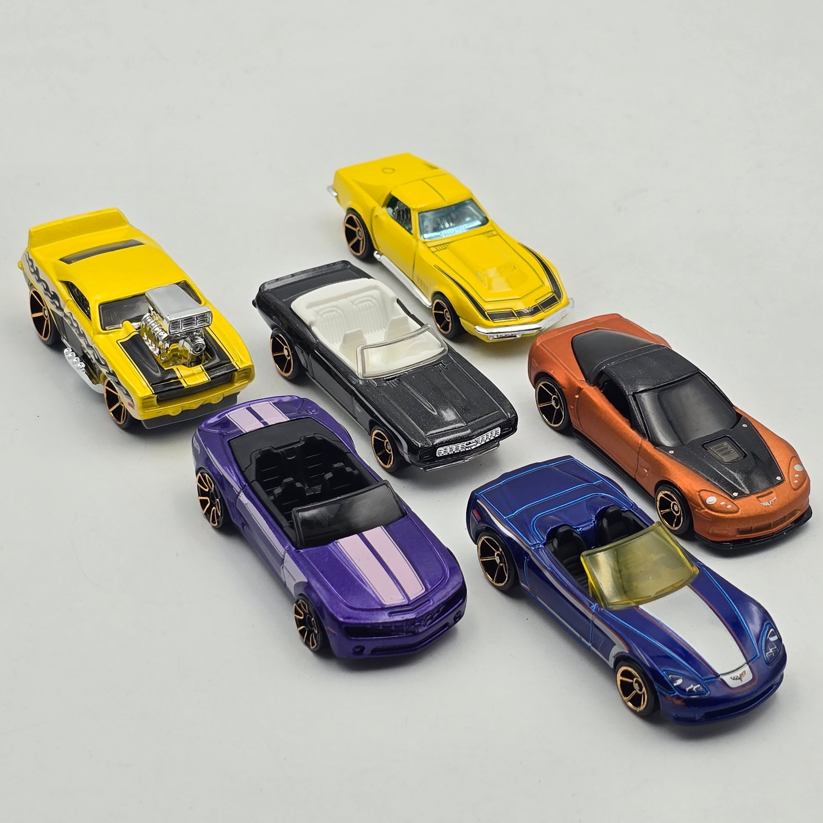 Hot Wheels Camaro and Corvette lot: Hot Wheels Faster Than Ever Camaro and Corvette lot of 6 Includes 3 different of each as seen All appear to be good condition with no issues of note Please check photos for complete descriptio