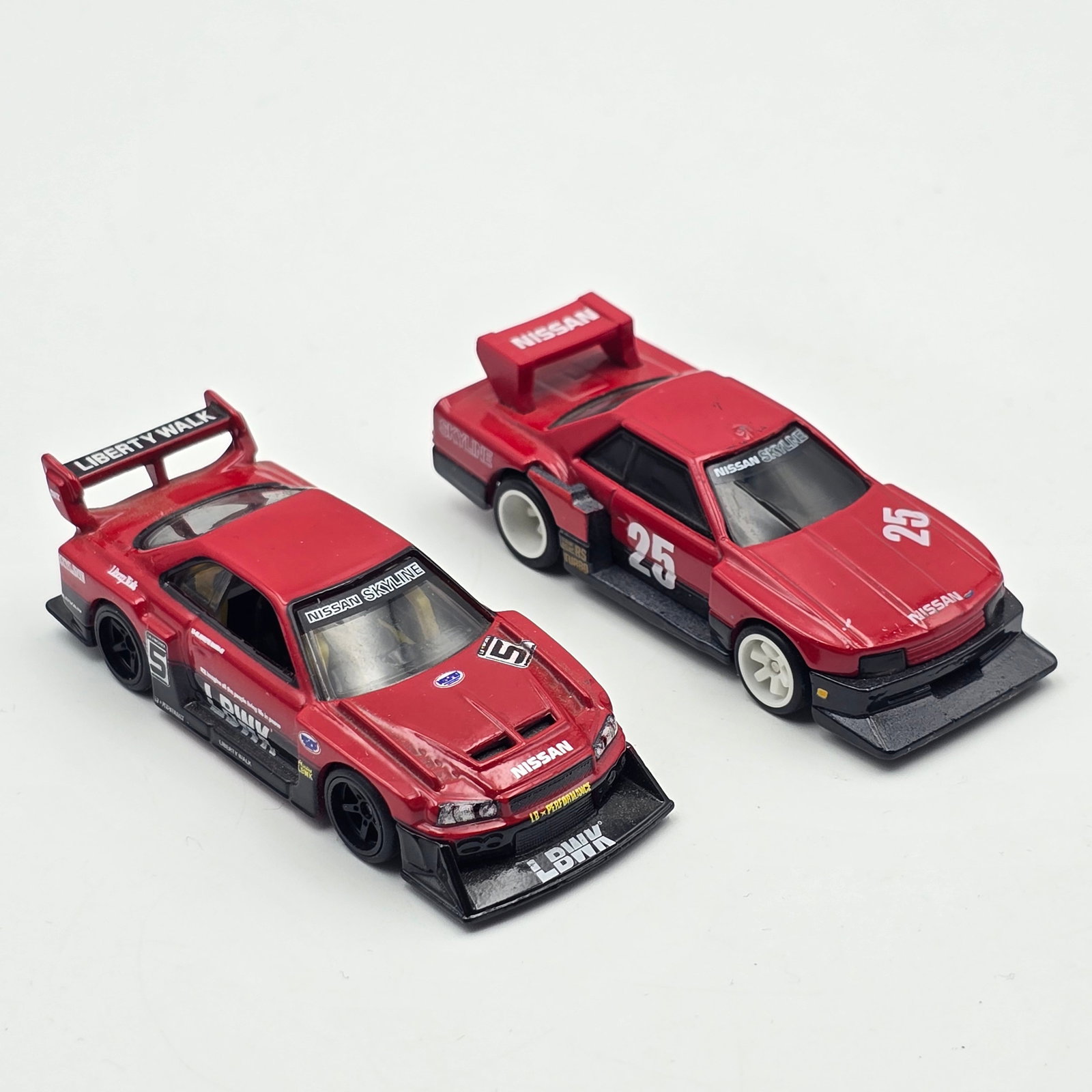 Hot Wheels Skyline Pair: Hot Wheels Premium Skyline Pair Includes 2 Different Skylines as seen Both appear to be in good condition with no issues of note Please check photos for complete description