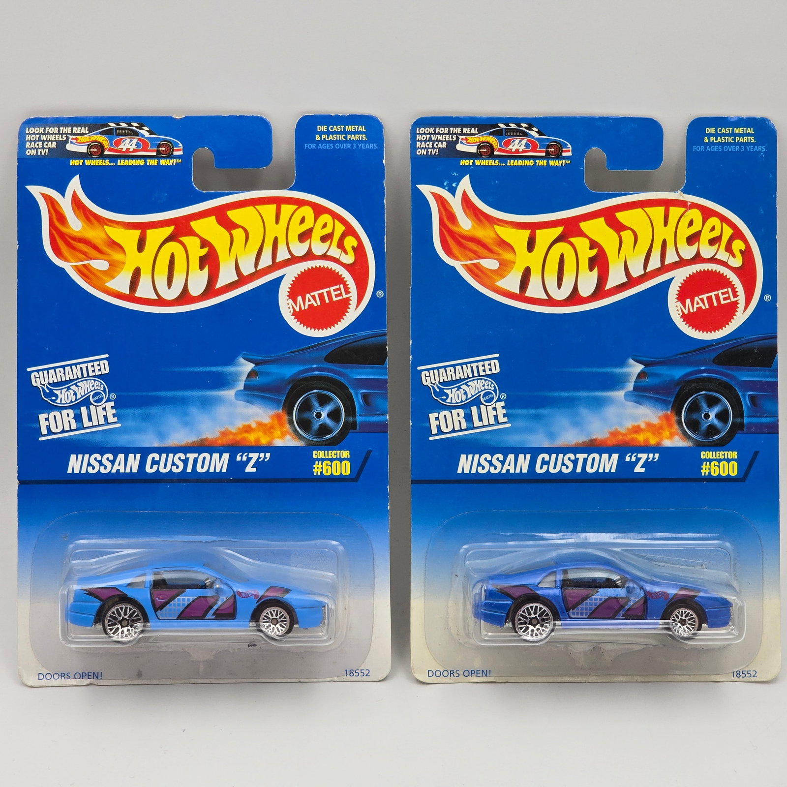 Hot Wheels Nissan Custom Z Pair: Hot Wheels #600 Nissan Custom Z Pair Both have Lace wheels, one is a dark variation the other is the lighter variation Cars appear to be in good condition with no issues of note Cards are in good shap