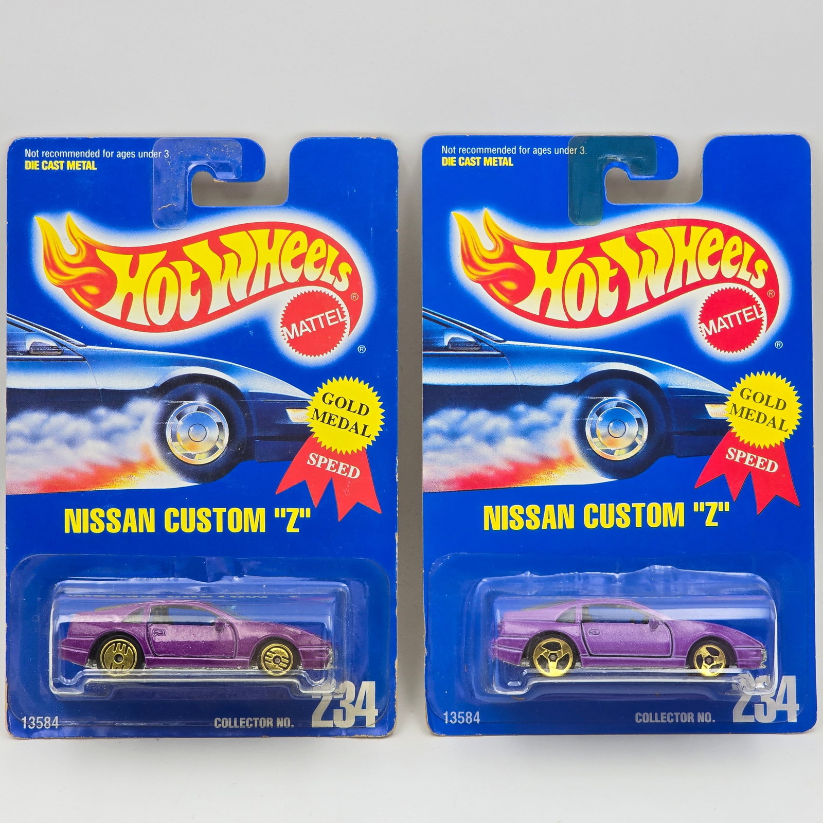 Hot Wheels Nissan Custom Z Pair: Hot Wheels #234 Nissan Custom Z Pair Two different wheel/paint variations included - Gold Ultra Hot (dark paint) and Gold 3 - spoke (light paint) Cars appear to be in good condition with no issues of 