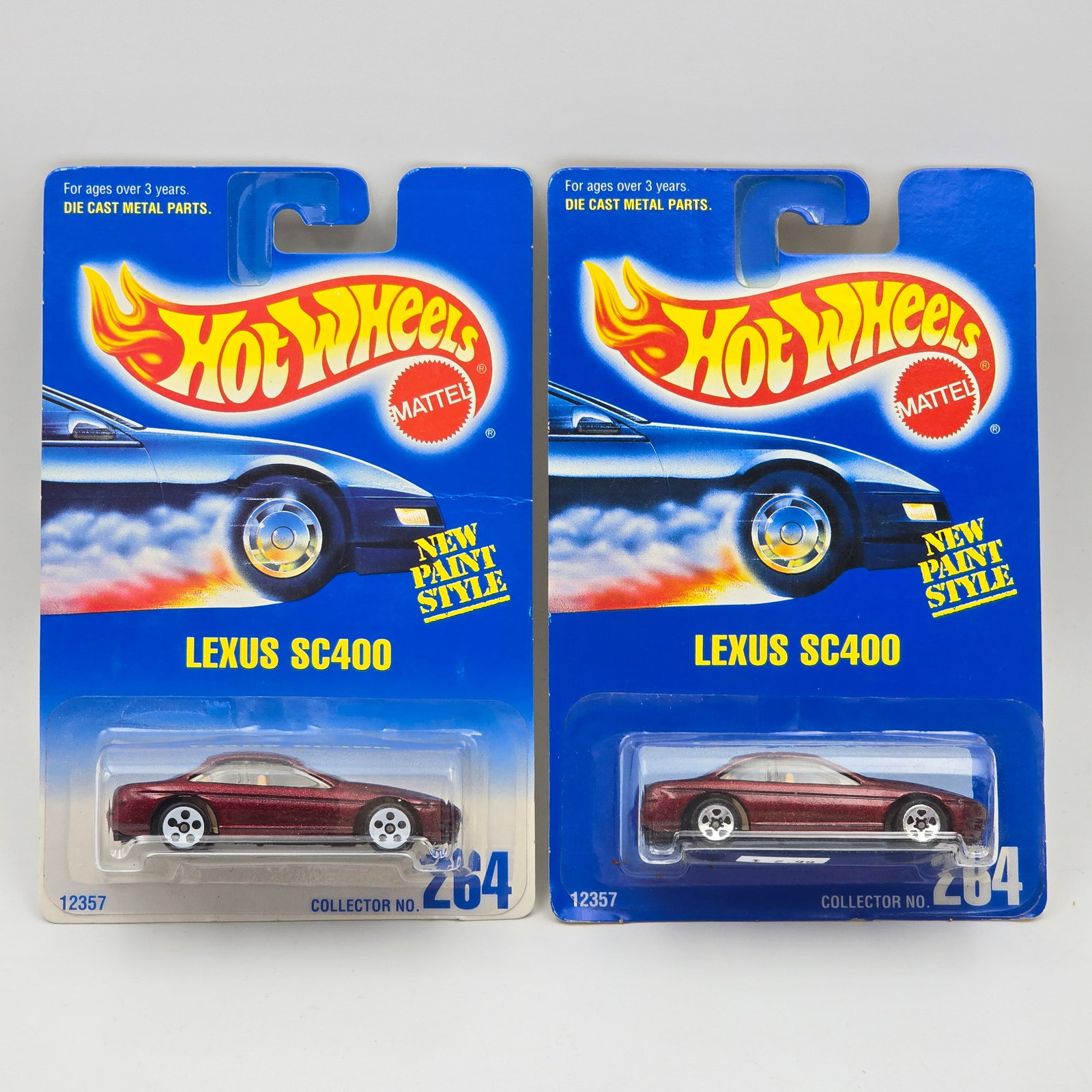 Hot Wheels Lexus SC400 Pair: Hot Wheels #264 Lexus SC400 Pair Two different wheel variations included - White 5 - hole and 5 - spoke (and card variations) Cars appear to be in good condition with no issues of note Cards are