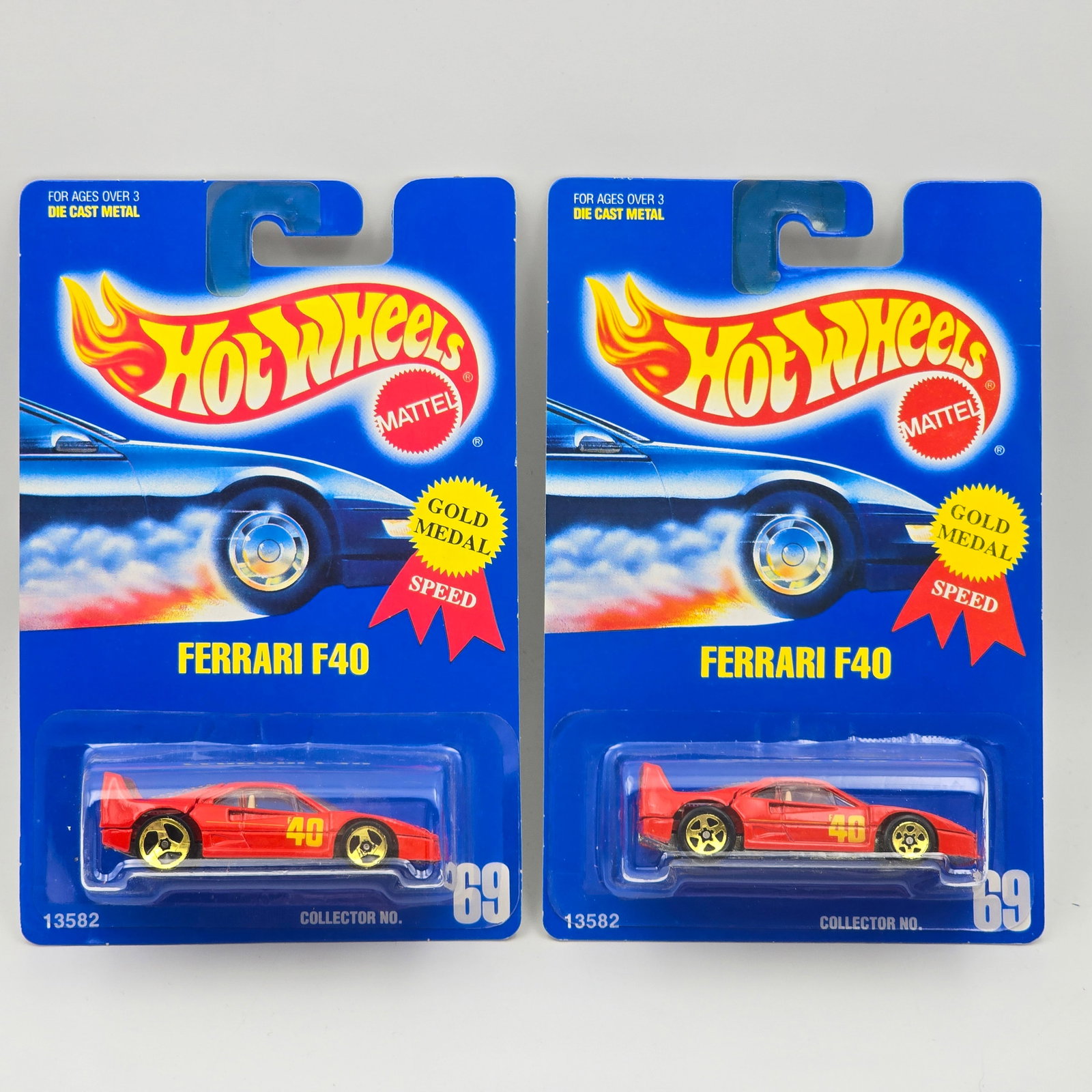 Hot Wheels Ferrari F40 Pair: Hot Wheels Ferrari F40 Pair Two different wheel variations included - Gold 3 - Spoke and Gold 5 - Spoke Cars appear to be in good condition with no issues of note Cards are in good shape, may have min