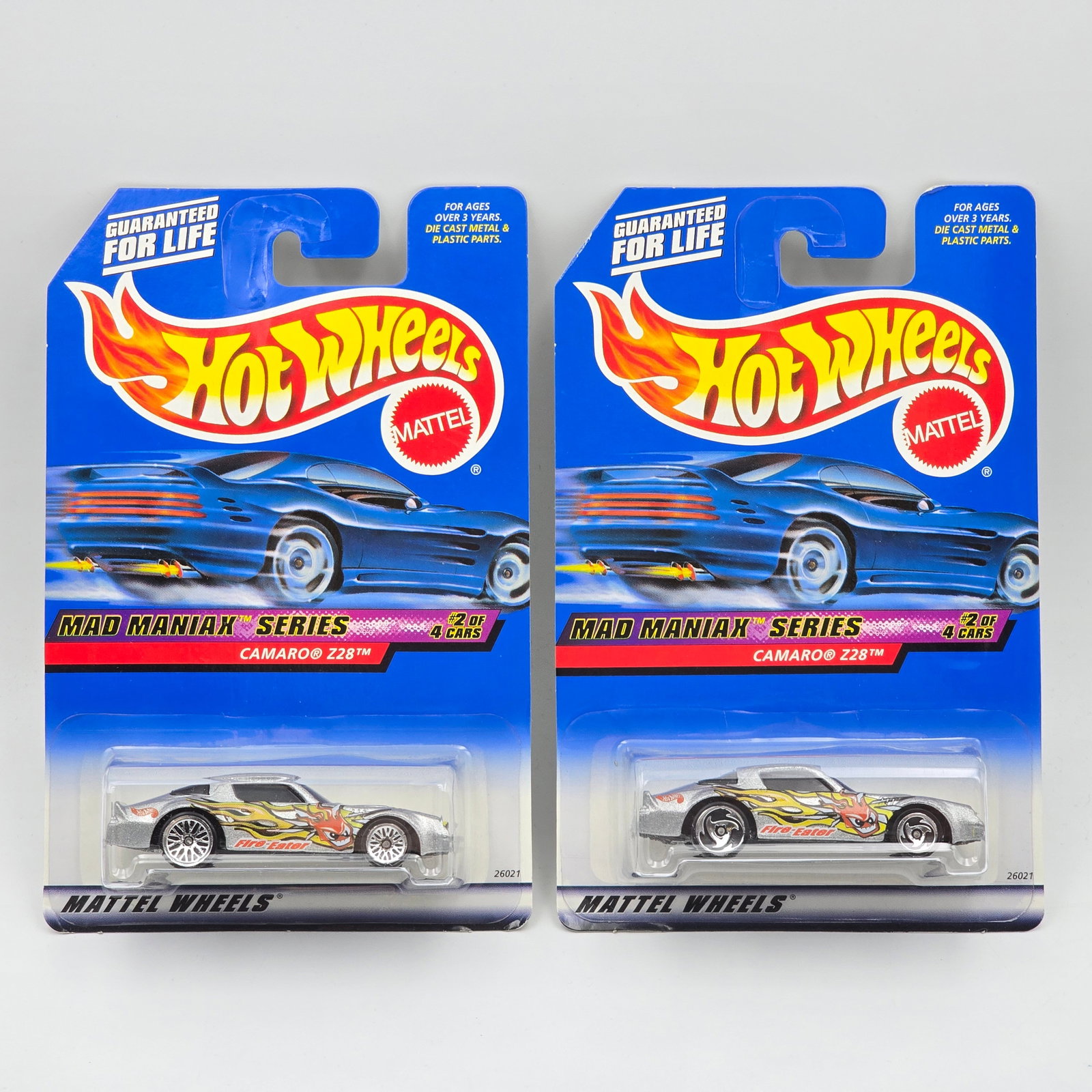 Hot Wheels Camaro Z28 Pair: Hot Wheels Mad Maniax Series Camaro Z28 Pair Two different wheel variations included - Lace and Saw Blade Cars appear to be in good condition with no issues of note Cards are in good shape, may have m