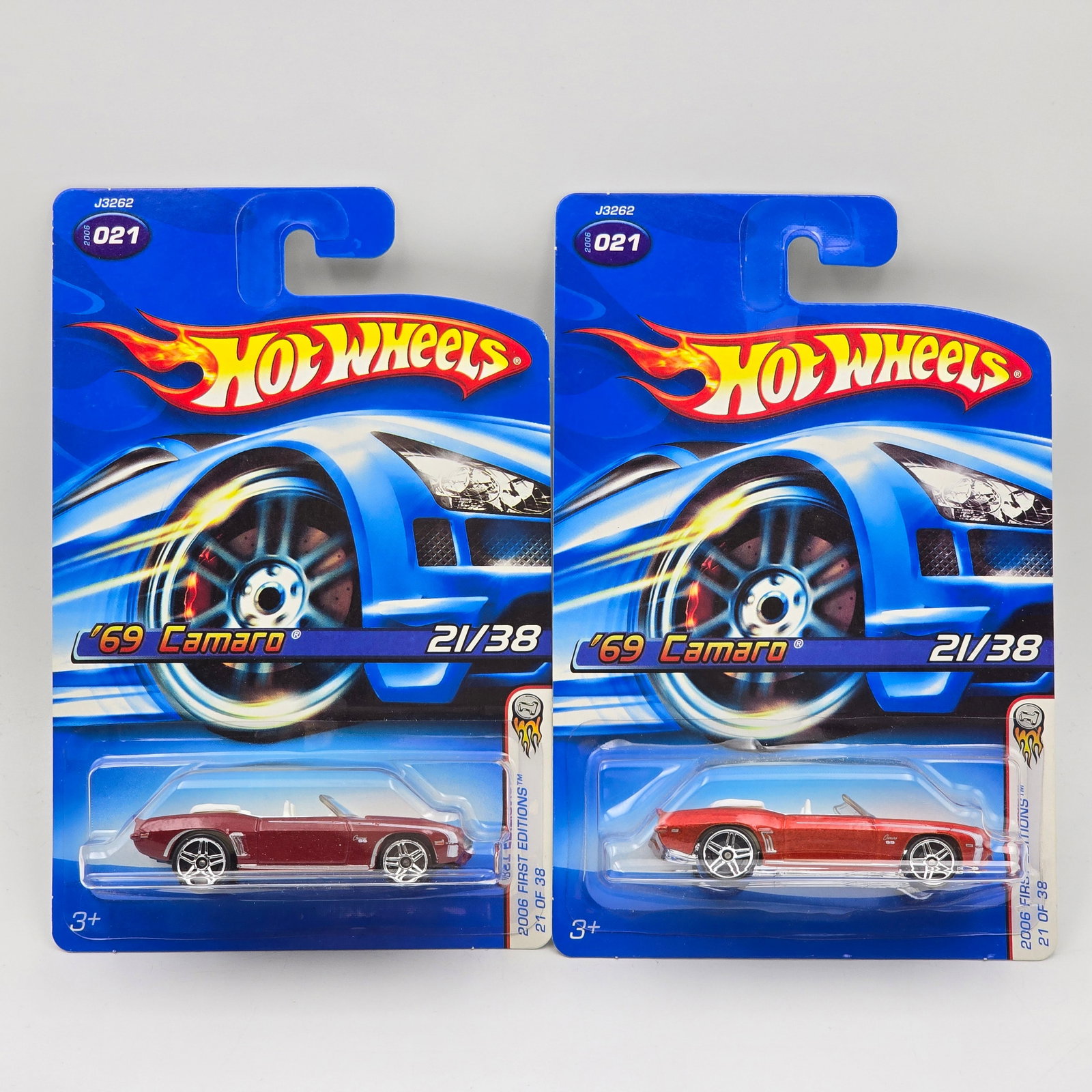 Hot Wheels 69 Camaro Pair: Base and color variation Hot Wheels 69 Camaro Convertible Pair one each dark and light red, both have PR5 wheels one with a black base and the other with chrome base Cars appear to be imn good