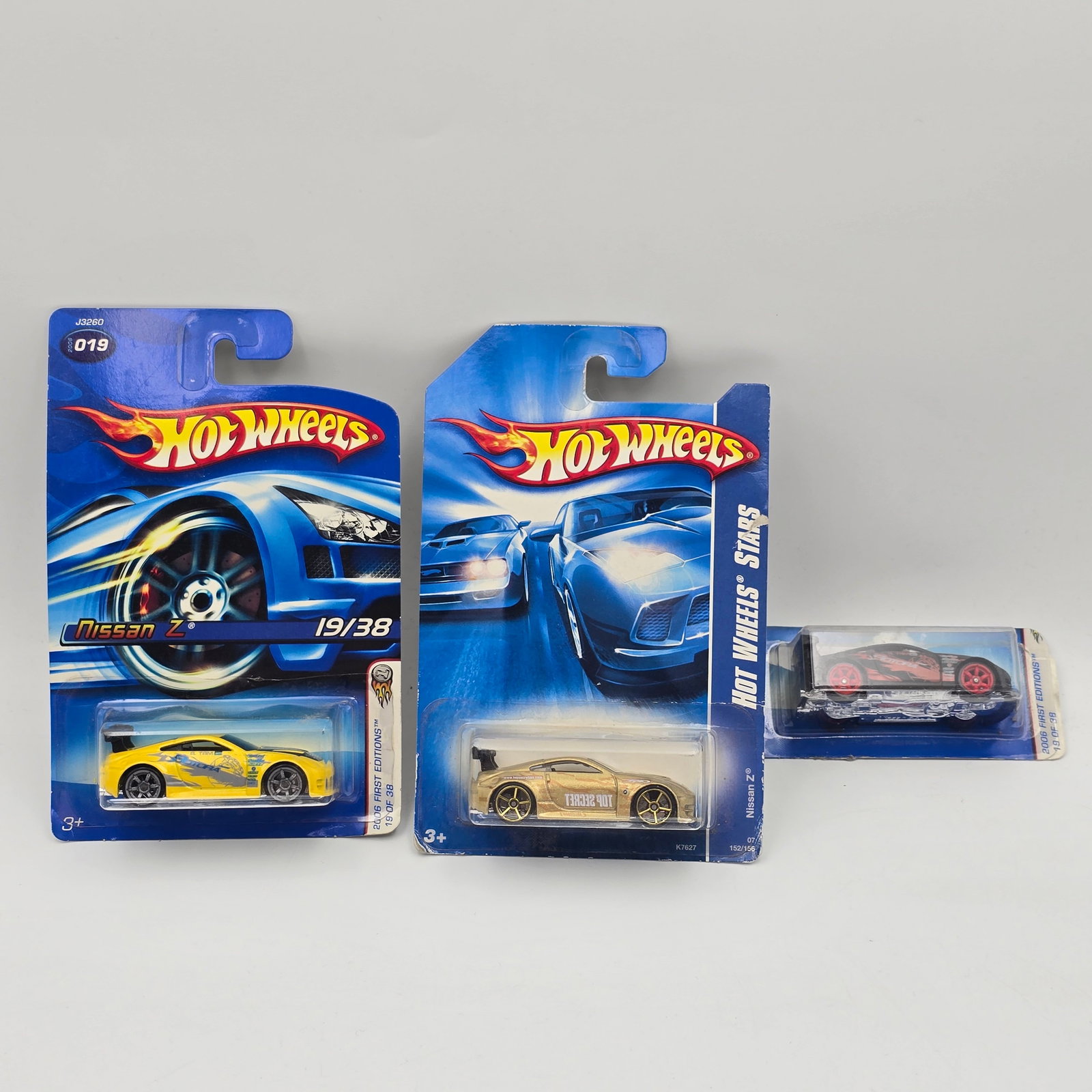 Hot Wheels Nissan Z lot of 3: Hot Wheels Nissan Z lot of 3 Includes Top Secret with the OH5 wheel variation and 2 different 2006 variations with the CoMold6 wheels as seen Cars appear to be in good condition with no issues of note