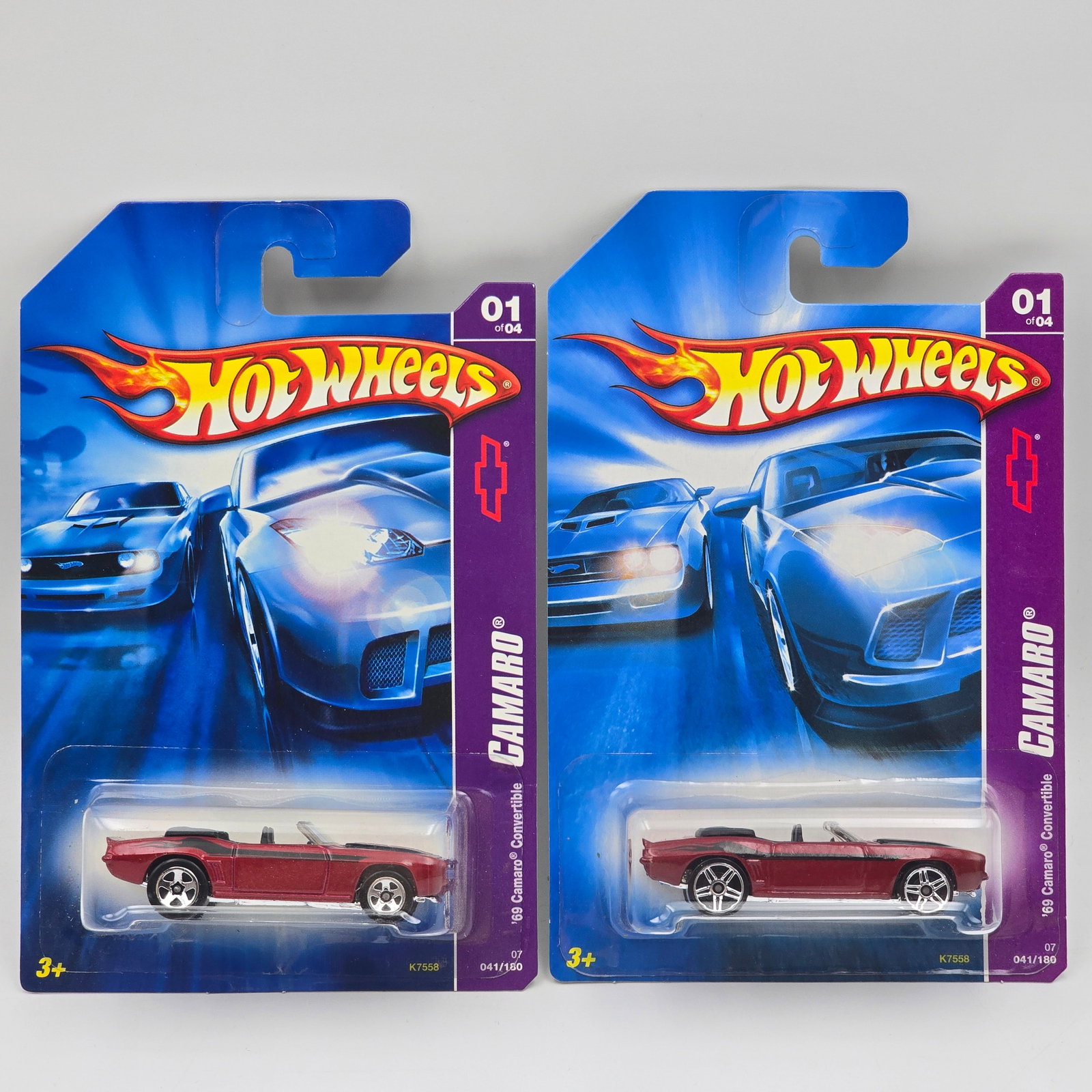 Hot Wheels 69 Camaro Pair: Hot Wheels Dark Red 69 Camaro Convertible Pair One has 5 spoke wheels, the other has open hole 5 spoke wheels Cars appear to be in good condition with no issues of note Cards are in good shape, may ha