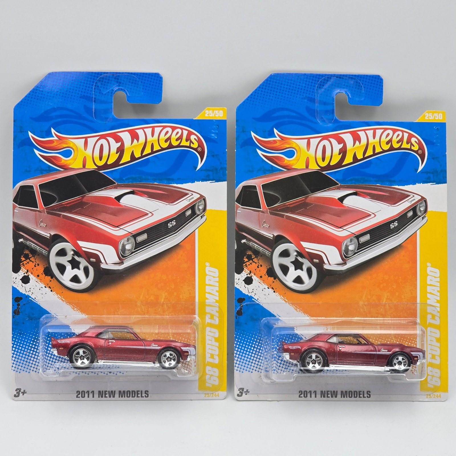 Hot Wheels 68 COPO Camaro Pair: Hot Wheels 2011 New Models 68 COPO Camaro pair interior variation- one is a htf balck interior the other is gray. Cars appear to be in good condition with no issues of note Cards are in
