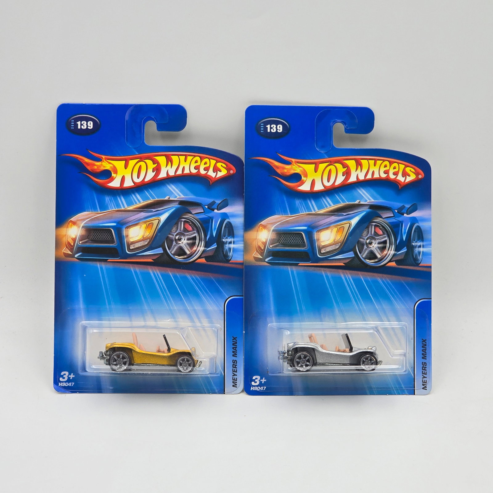 Hot Wheels Myers Manx Pair: Hot Wheels Myers Manx Pair Kmart Exclusives, one in silver the other in gold Cars appear to be in good condition with no issues of note Cards are good but may have edge dings, small creases and/or wea