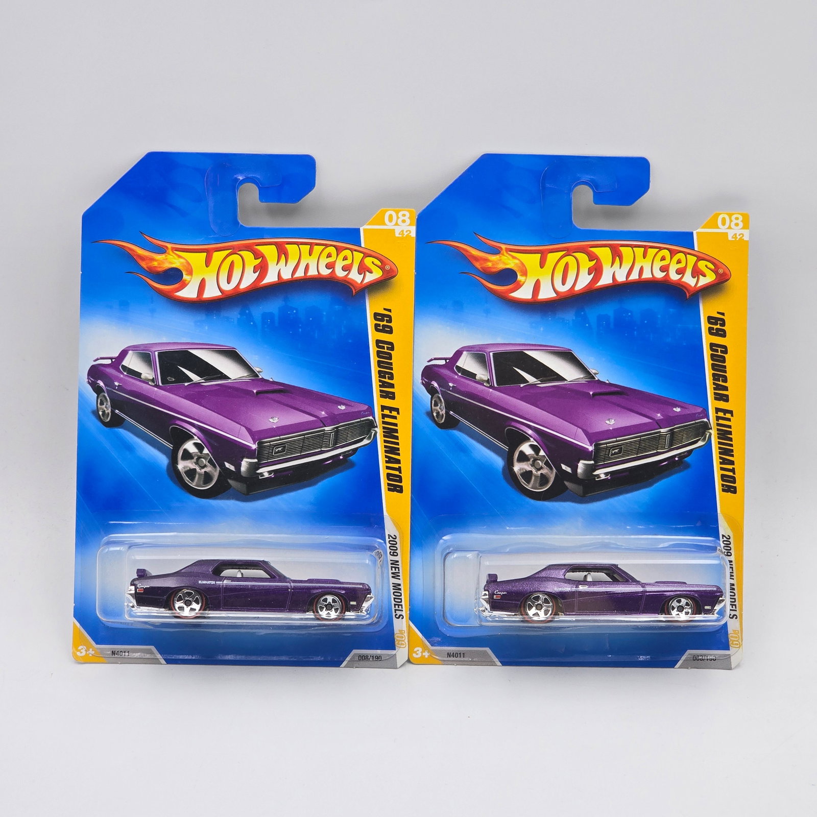 Hot Wheels 69 Cougar Pair: Hot Wheels 2009 New Models purple 69 Cougar Eliminator Pair both are Walmart exclusive redline variations of the car Cars appear to be excellent to near mint with no issues of note Cards are good but 