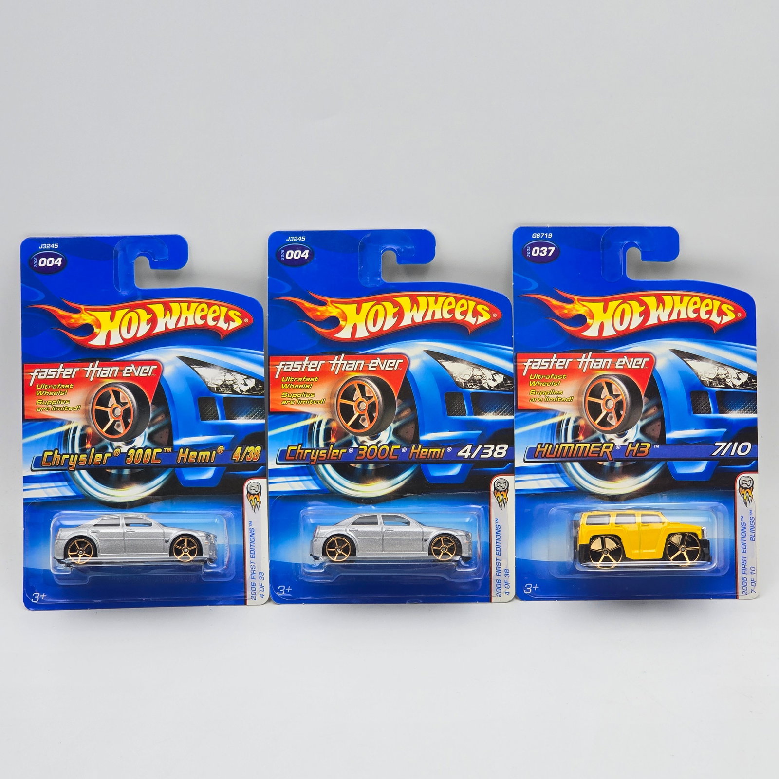 Hot Wheels Mixed lot of 3: Hot Wheels Faster than ever wheel variation mixed lot of 3 Includes - (2) silver Chrysler 300C Hemis and a yellow Hummer H3 Cars appear to be excellent to near mint with no issues of note Cards are go