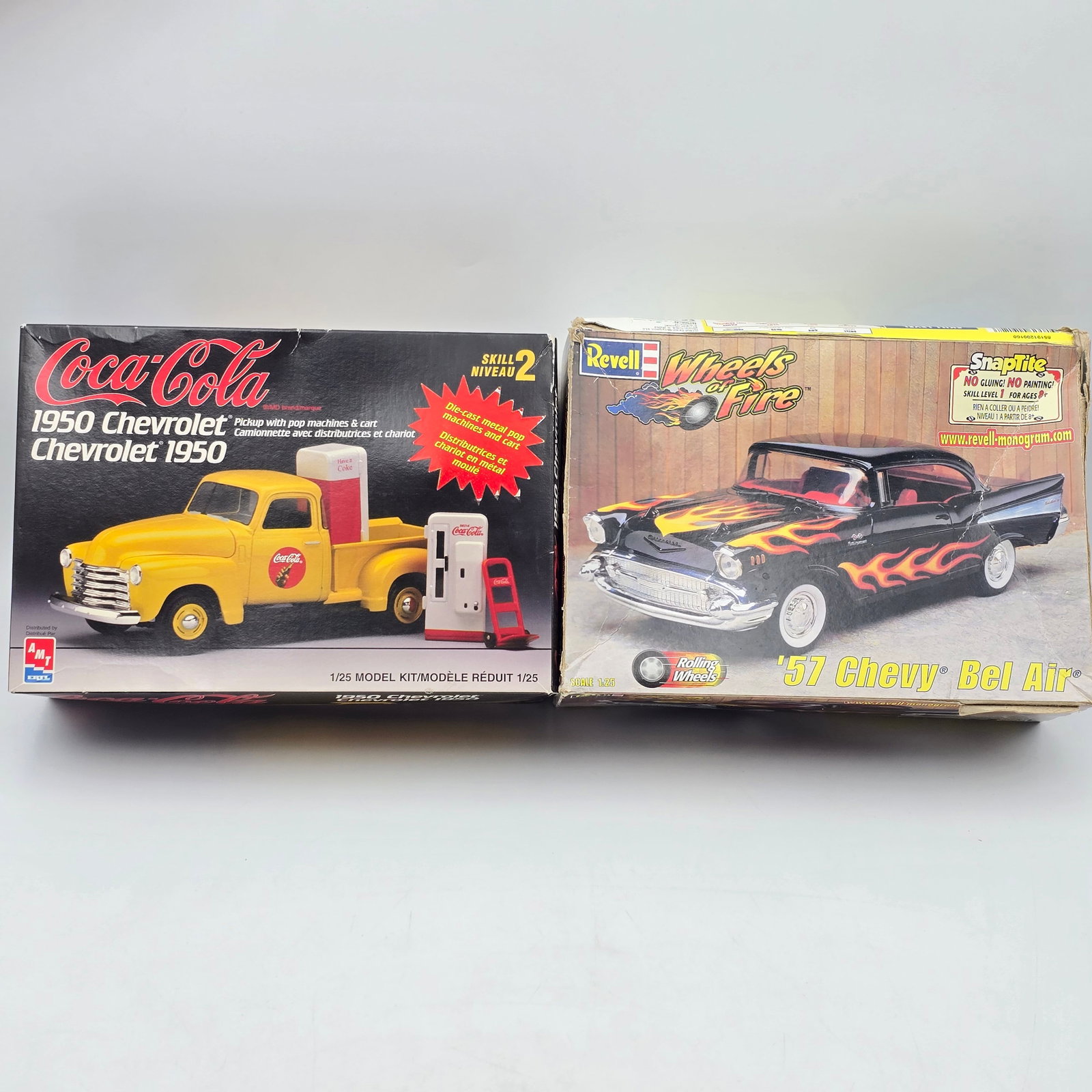 Pair of Chevy Model Kits: Pair of model kits, one Revell and one AMI. Both include the box and look to be complete and unassemabled. See photos. 1-1950 Chevy pick Up (1997) 1-1957 Chevy Bel Air (1999) Boxes have some