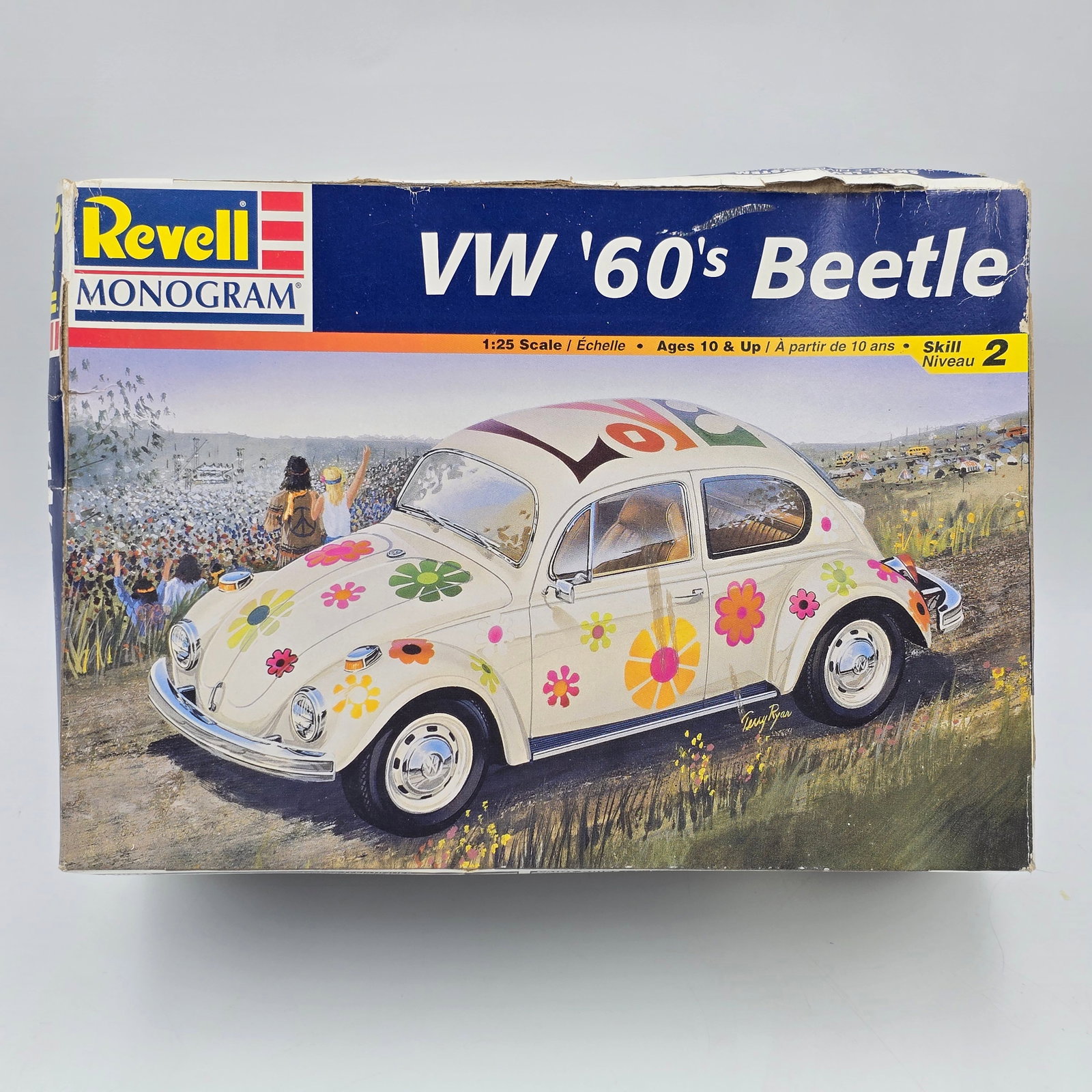 Revell VW Model Kit: Lot includes Revell 60' VW Beetle (1998) Model kit with the box and appears to be complete and unassembled. See photos. The box has some Storage/shelf wear, including damage to the corners and some