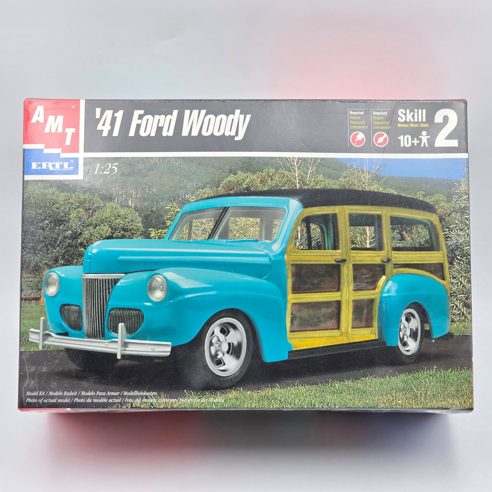 AMT Ford Model Kit: This lot includes AMT '41 Ford Woody Model kit (1999) With box and appears to be complete and unassembled. Factory sealed, see photos for more. 