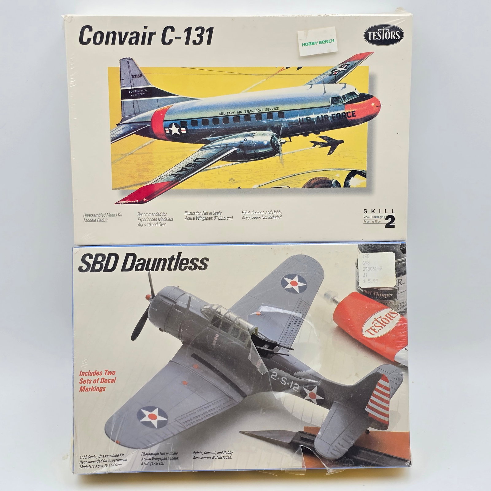 Pair of Testors Model Kits: Pair of Testors Model Kits, Both have box and look to be complete and unassembled. 1- SBD Dauntless (1984) 1- Convair C-131 (1994) Both appear to be Factory sealed/unopened, the Dauntless Model does h