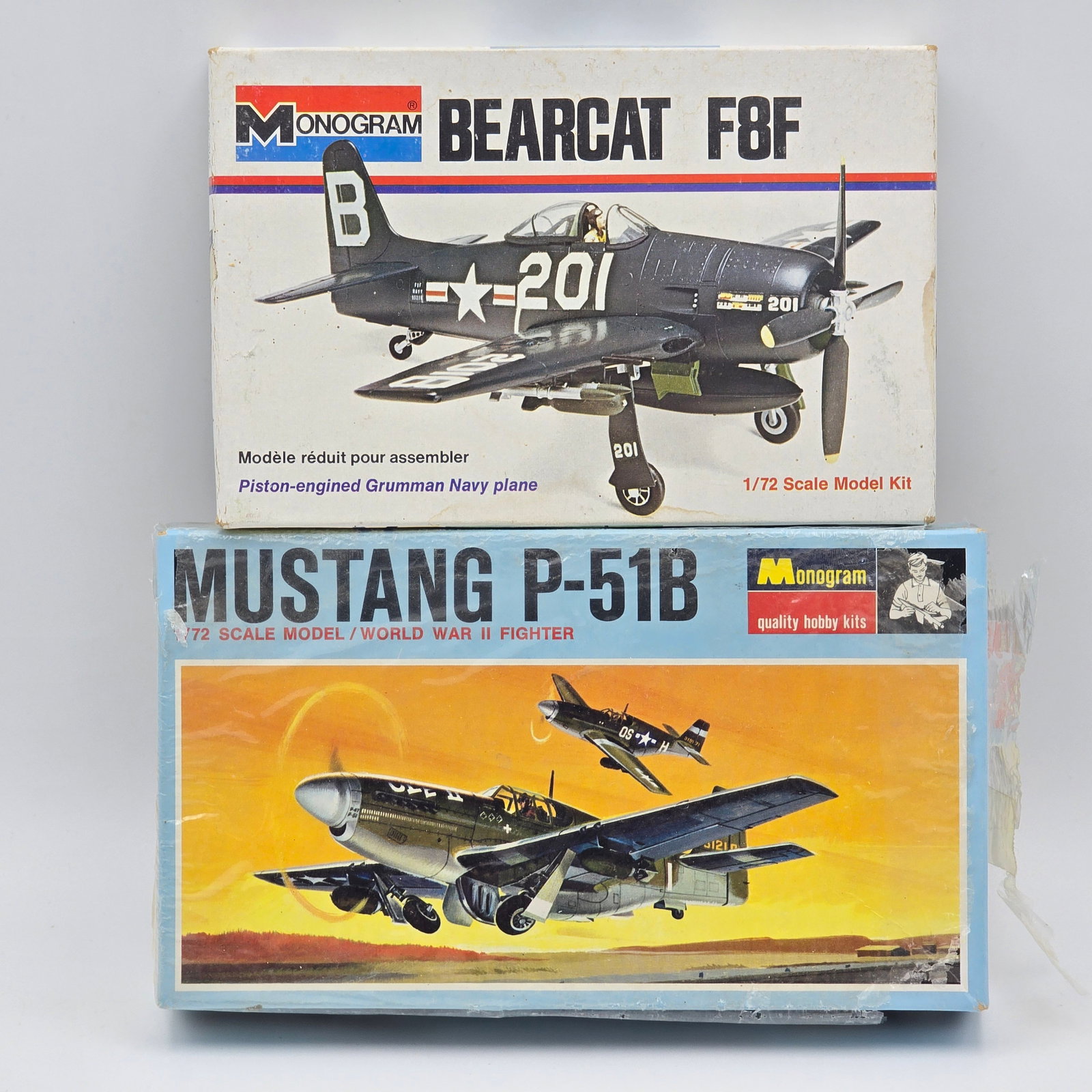 Pair of Monogram Model Kits: Pair of Monogram Model Kits, Both have box and look to be unassembled 1- Bearcat F8F (1979) - Most piece look to be detached from trees, unclear if its complete. 1- Mustang P-51B (1967) - 