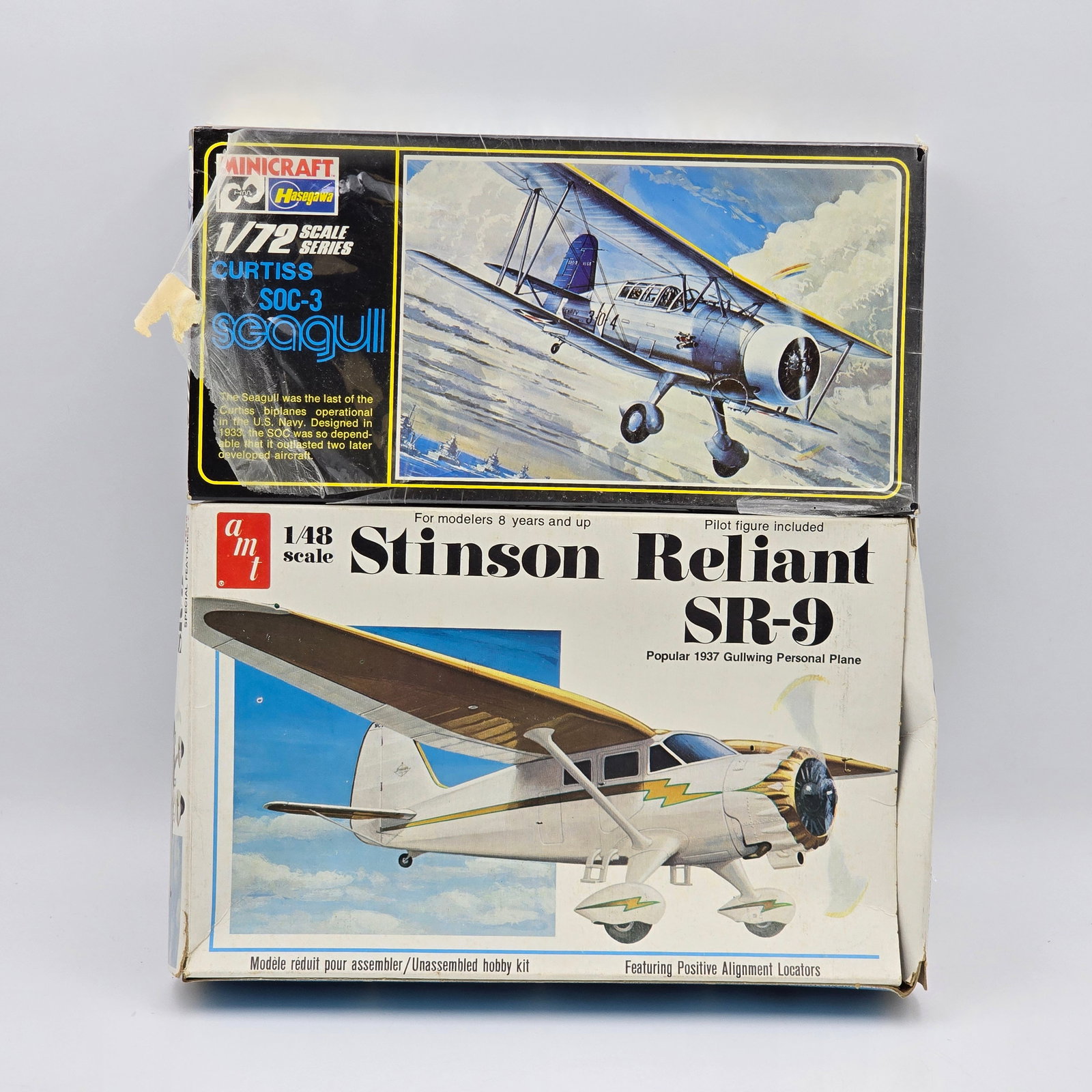 Pair of Plane Model Kits: Pair of Plane Model Kits, One AMT and one Minicraft. Both have box and look to be complete and unassembled. 1- Curtiss SOC-3 Seagull - pieces look to be factory sealed/unopened. 1- Stinson Reliant