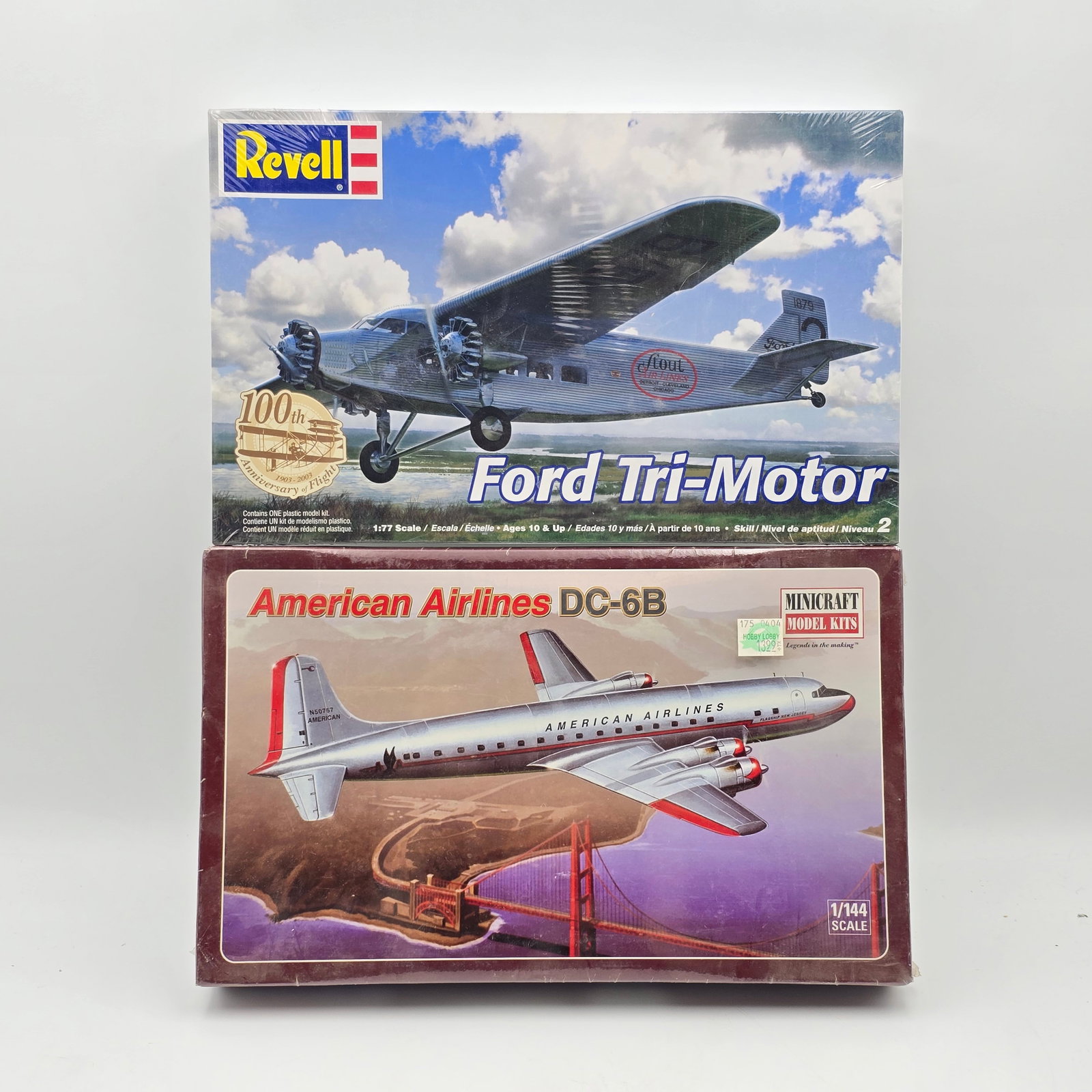 Pair of Plane Model Kits: Pair of Plane Model Kits, one Revell and one Minicraft. Both with box and look to be complete and unassembled. 1- Ford Tri-Motor (2005) 1- American Airline DC-6B (2001) Both boxes look to be fac