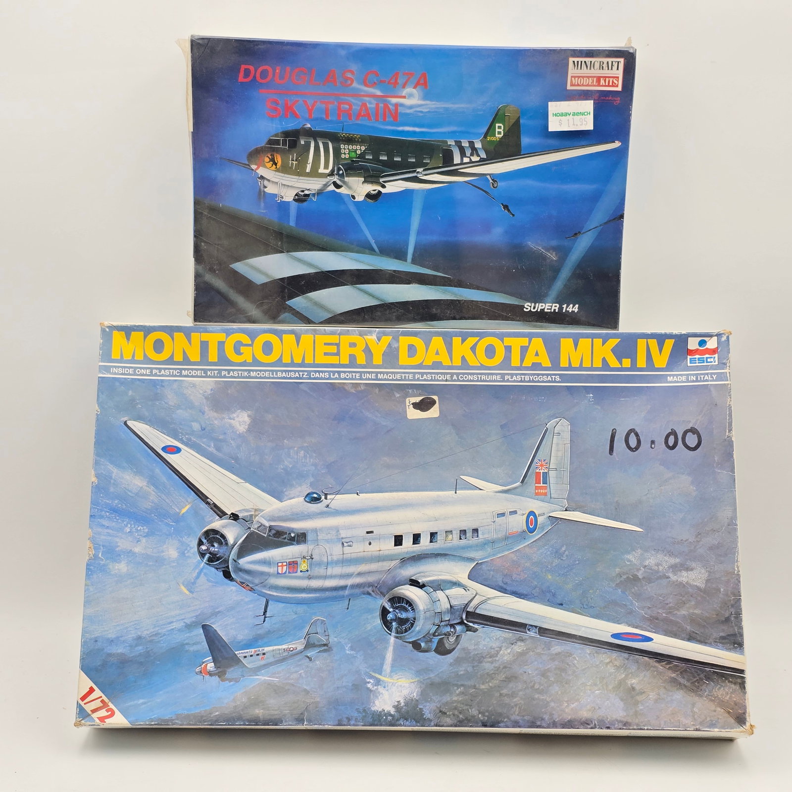Pair of Model Kits: Pair of Model kits, one ESCI and one Minicraft. Both with box and look to be complete and unassembled. 1- Douglas C-47A Skytrain (2002) 1- Montgomery Dakota MK IV (1972) - pieces look to be factory