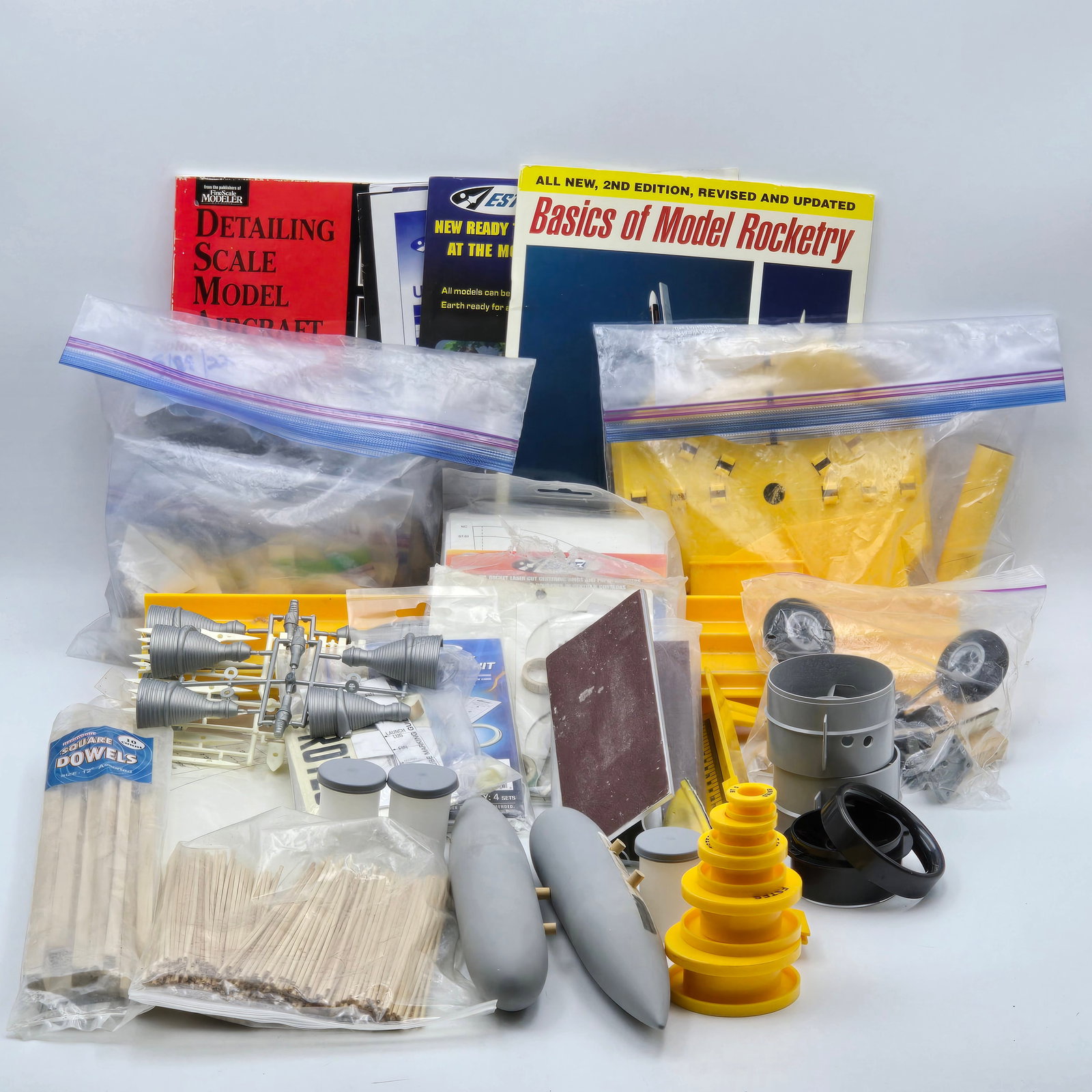 Model Rocket Book and Accessory Lot: Model Rocket Book and Accessory lot Large lot of parts and books Please see photos for complete description of what is included