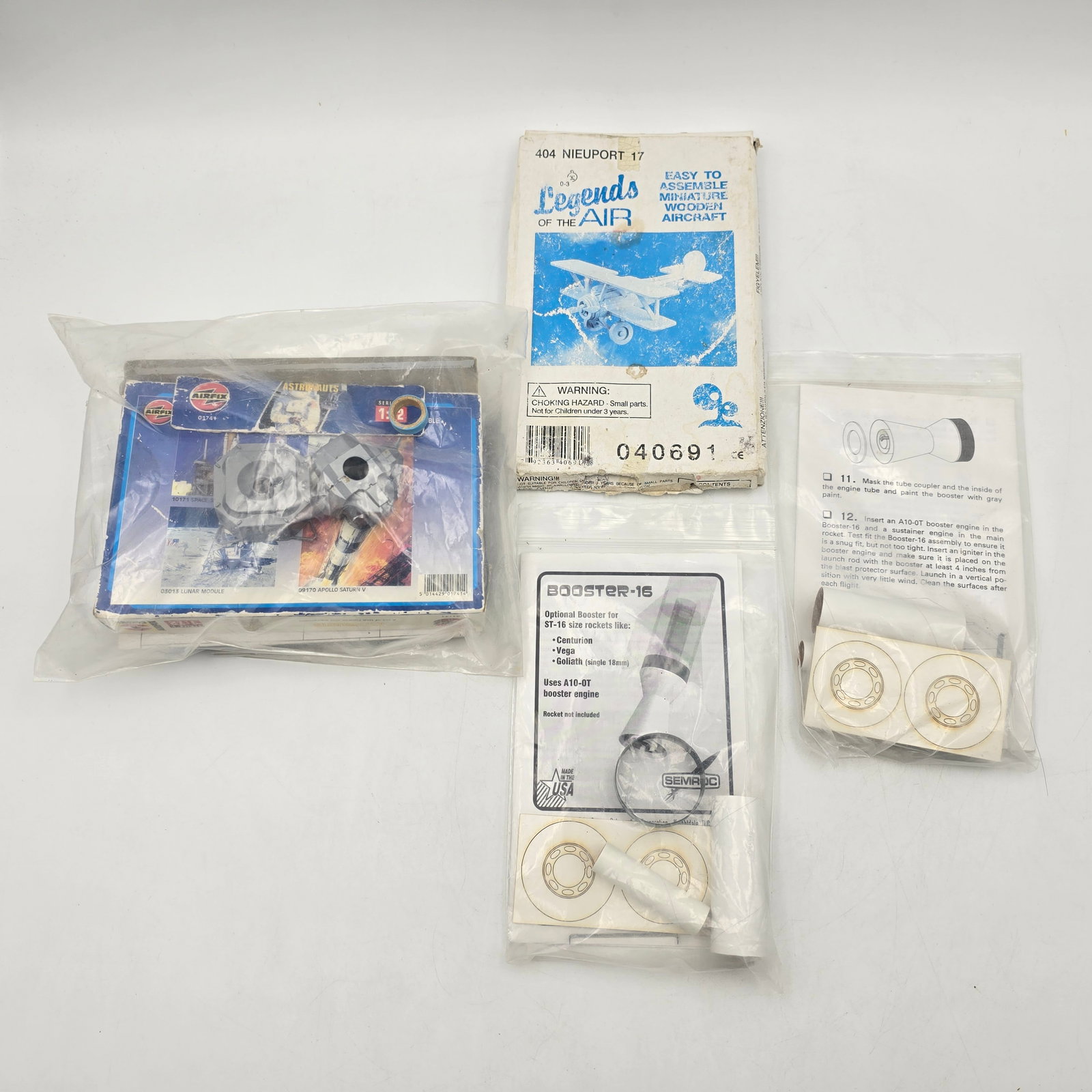 Model Rocket Parts Lot: Model Rocket parts lot Miscellaneous parts including an airfix model and a wooden plane model See photos for complete description of all that is included