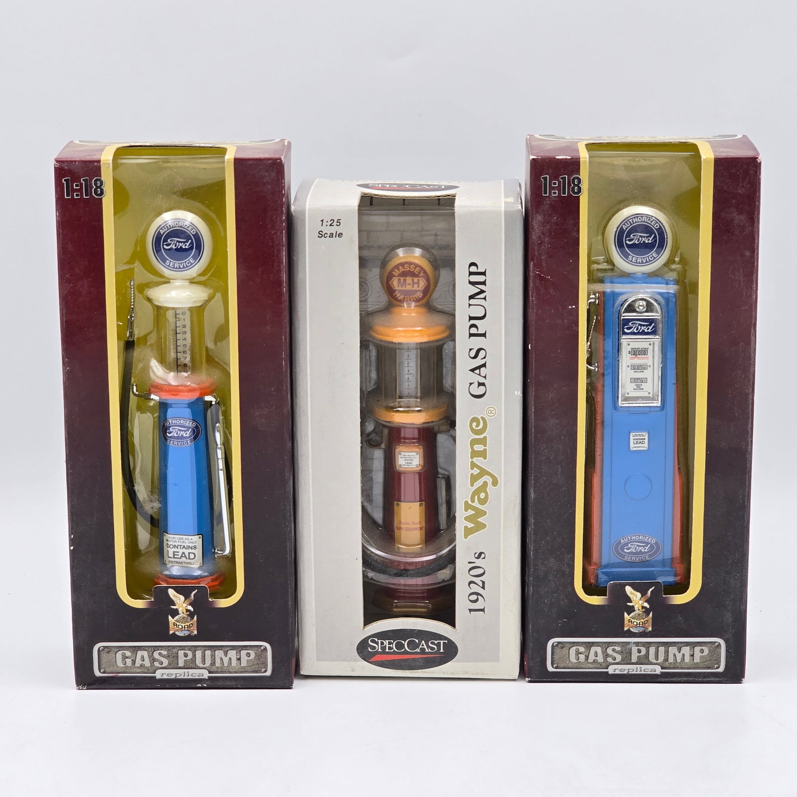 Mini Diecast Gas Pump Replica Lot of 3: Mini Diecast Gas Pump replica lot of 3 Includes - (2) Yatming 1/25 scale Ford Pumps and a 1/18 Speccast Wayne Pump All appear excellent in very good original boxes Please check photos for complete