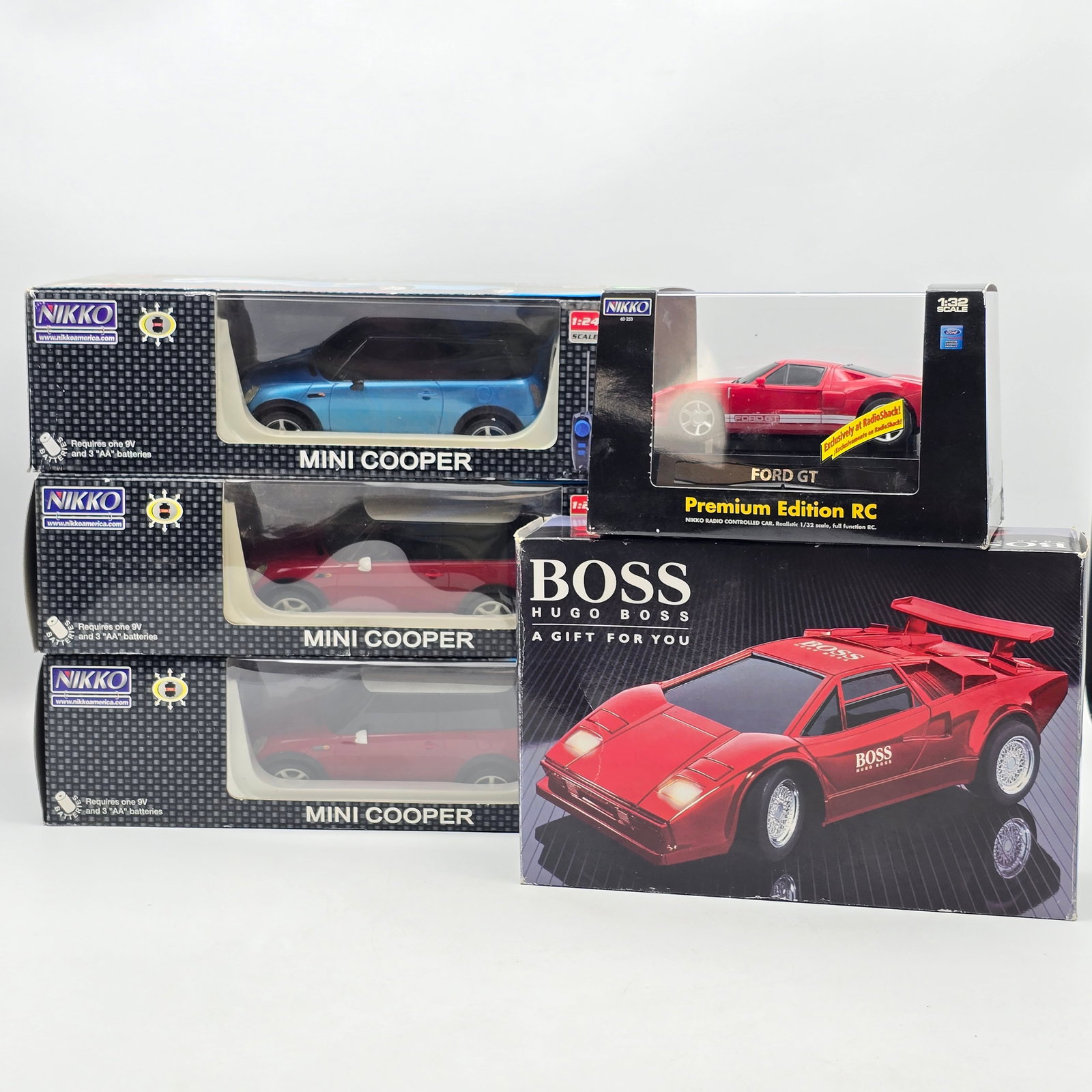 Lot of 5 Nikko RC's: Lot of 5 Nikko RC's 3- Mini cooper 1-Ford Gt 1- The Boss Look to be in decent condition Boxes May have some shelf/storage wear. Please see photos for more!