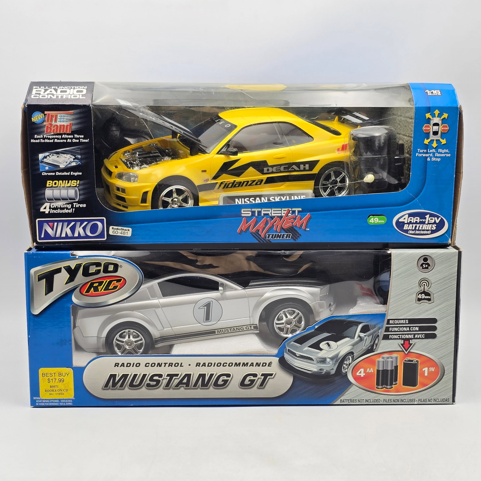 Pair of RC Cars: Pair of RC Cars, one Nikko and one tyco. Both with the box and look to be in decent condition. 1- Mustang Gt 1- Nissan Skyline See photos for more!